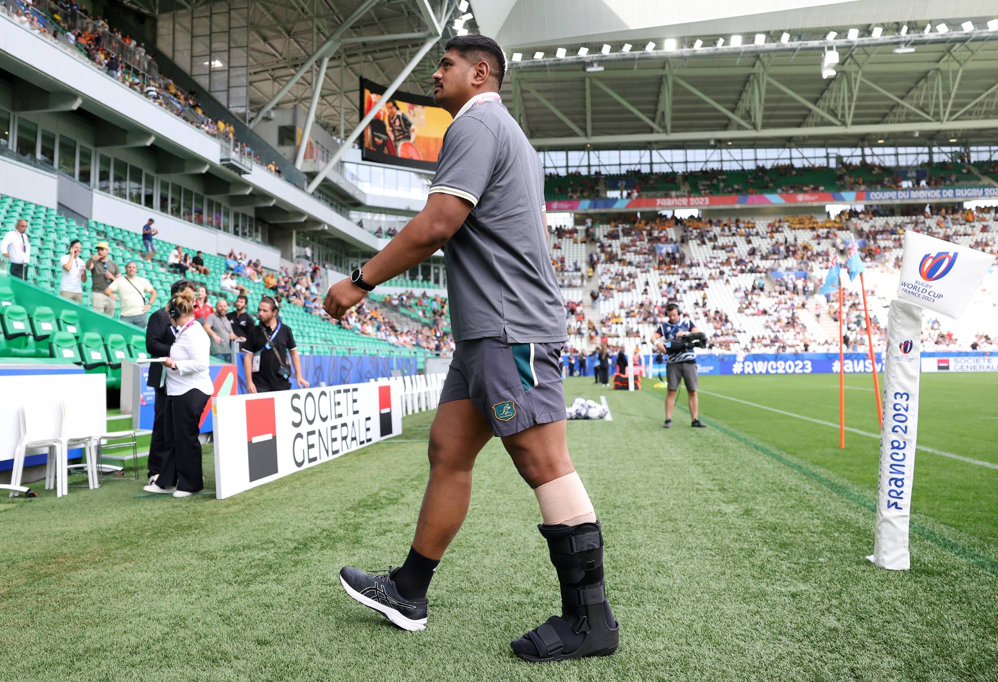 Will Skelton of Australia looks on after inspecting the pitch with teammates, whilst wearing a protective boot on his left foot after injuring his calf, during the Rugby World Cup France 2023 match between Australia and Fiji at Stade Geoffroy-Guichard on September 17, 2023 in Saint-Etienne, France. (Photo by Chris Hyde/Getty Images)