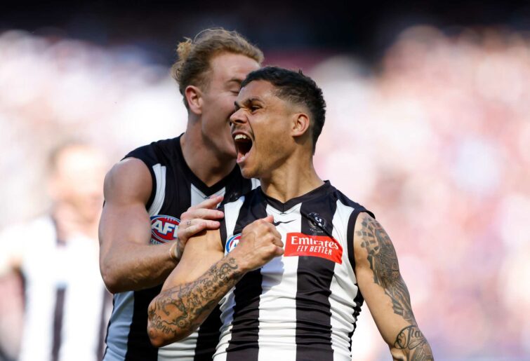 MELBOURNE, AUSTRALIA - SEPTEMBER 30: Bobby Hill of the Magpies celebrates a goal during the 2023 AFL Grand Final match between the Collingwood Magpies and the Brisbane Lions at the Melbourne Cricket Ground on September 30, 2023 in Melbourne, Australia. (Photo by Dylan Burns/AFL Photos via Getty Images)