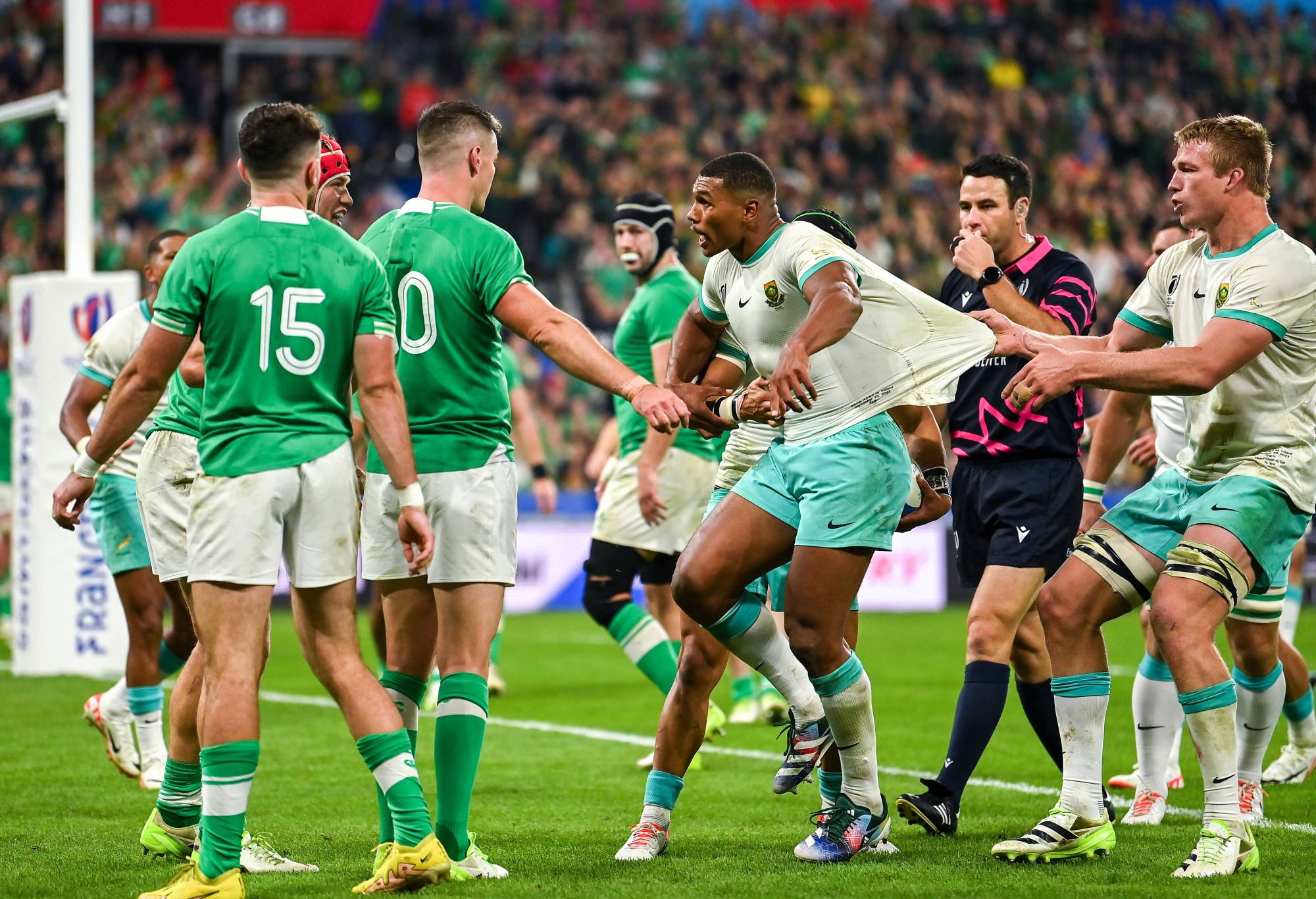 Damian Willemse of South Africa is dragged away from speaking to Jonathan Sexton of Ireland after the first South African try during the 2023 Rugby World Cup Pool B match between South Africa and Ireland at Stade de France in Paris, France. (Photo By Brendan Moran/Sportsfile via Getty Images)