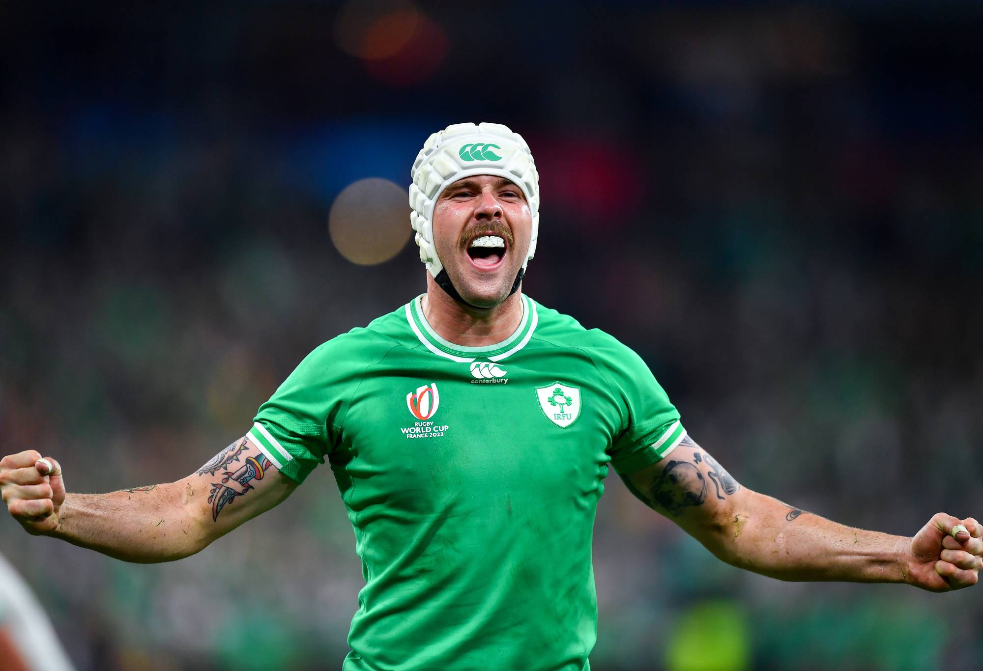 Mack Hansen of Ireland celebrates victory at full-time following the Rugby World Cup France 2023 match between South Africa and Ireland at Stade de France on September 23, 2023 in Paris, France. (Photo by Franco Arland/Quality Sport Images/Getty Images)