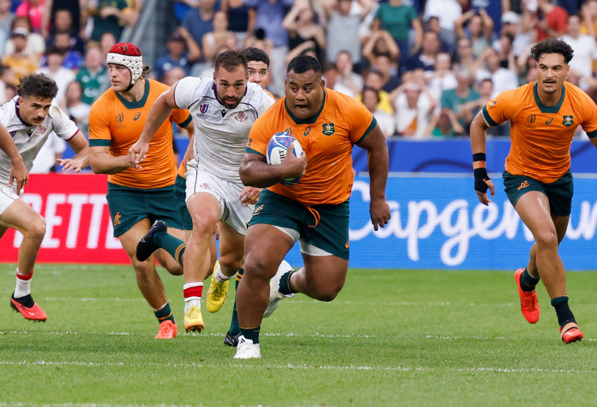 Taniela Tupou #3 of Australia runs with the ball during the Rugby World Cup France 2023 match between Australia and Georgia at Stade de France on September 9, 2023 in Paris, France. (Photo by Catherine Steenkeste/Getty Images)