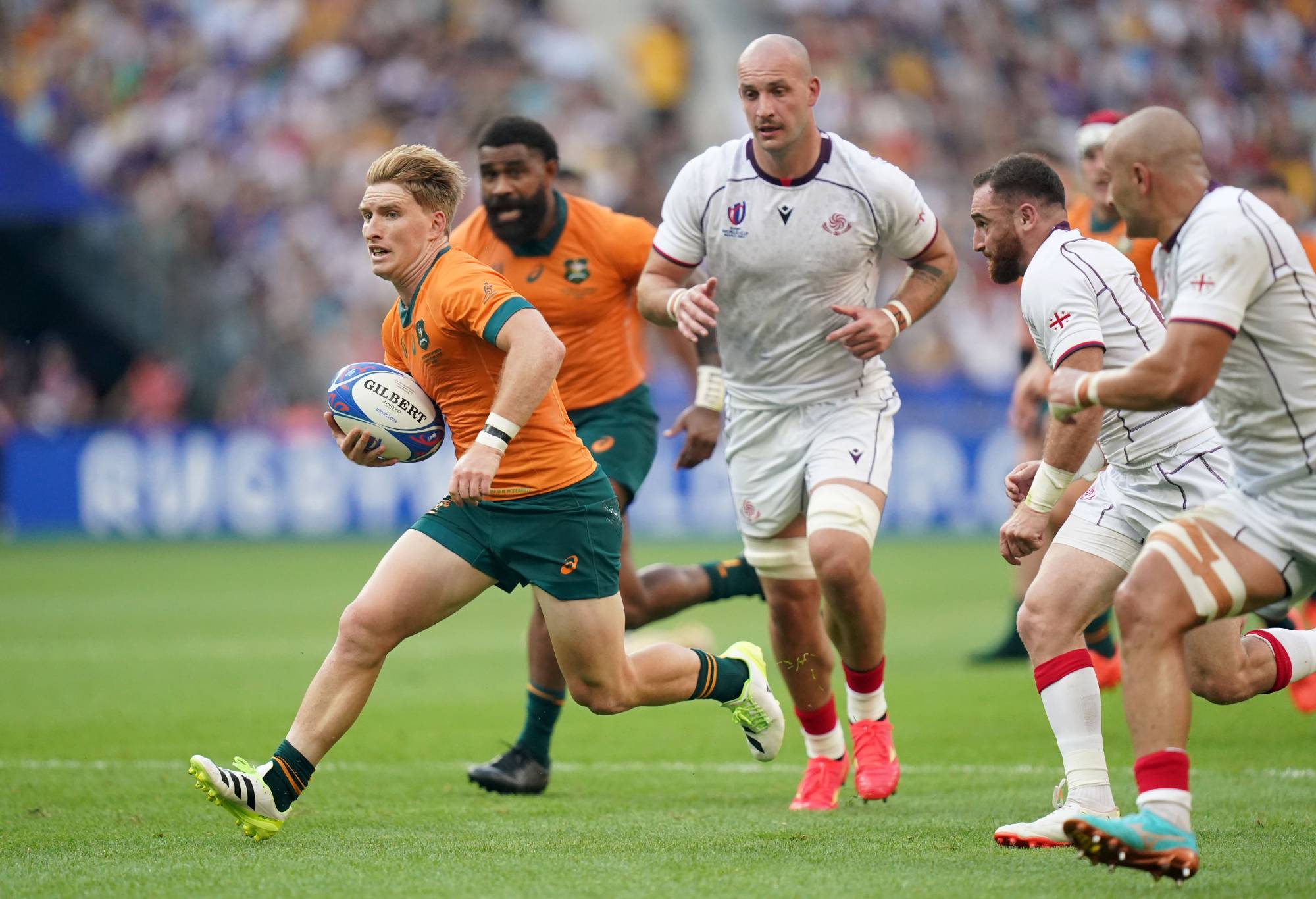 Australia's Tate McDermott (left) runs with the ball during the 2023 Rugby World Cup Pool C match at the Stade de France, Paris. Picture date: Saturday September 9, 2023. (Photo by Adam Davy/PA Images via Getty Images)