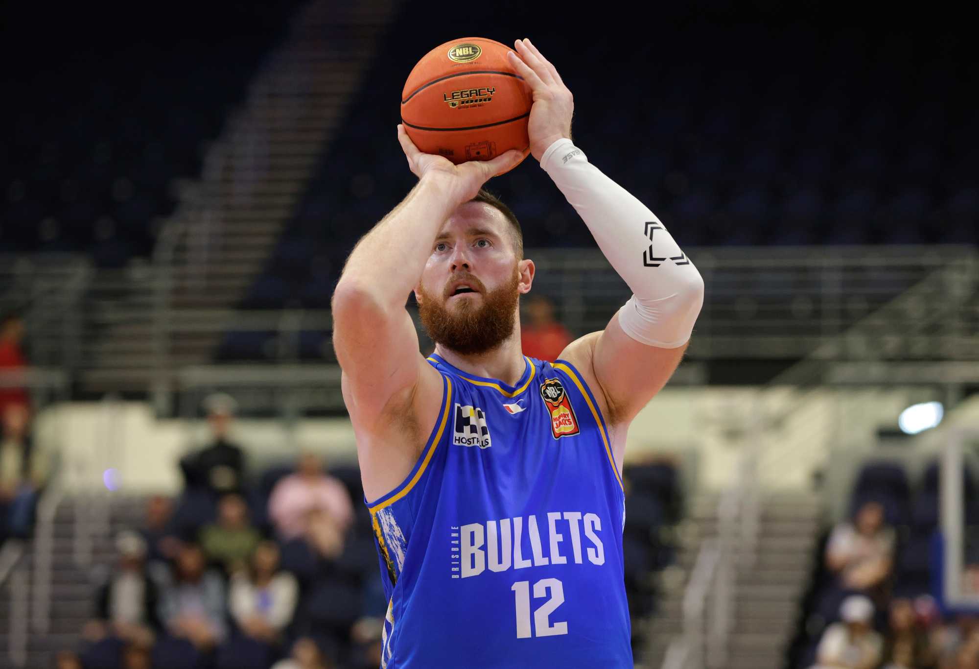 GOLD COAST, AUSTRALIA - SEPTEMBER 20: Aron Baynes of the Bullets shoots from the free throw line during the 2023 NBL Blitz match between Brisbane Bullets and Illawarra Hawks at Gold Coast Convention and Exhibition Centre on September 20, 2023 in Gold Coast, Australia. (Photo by Russell Freeman/Getty Images for NBL)