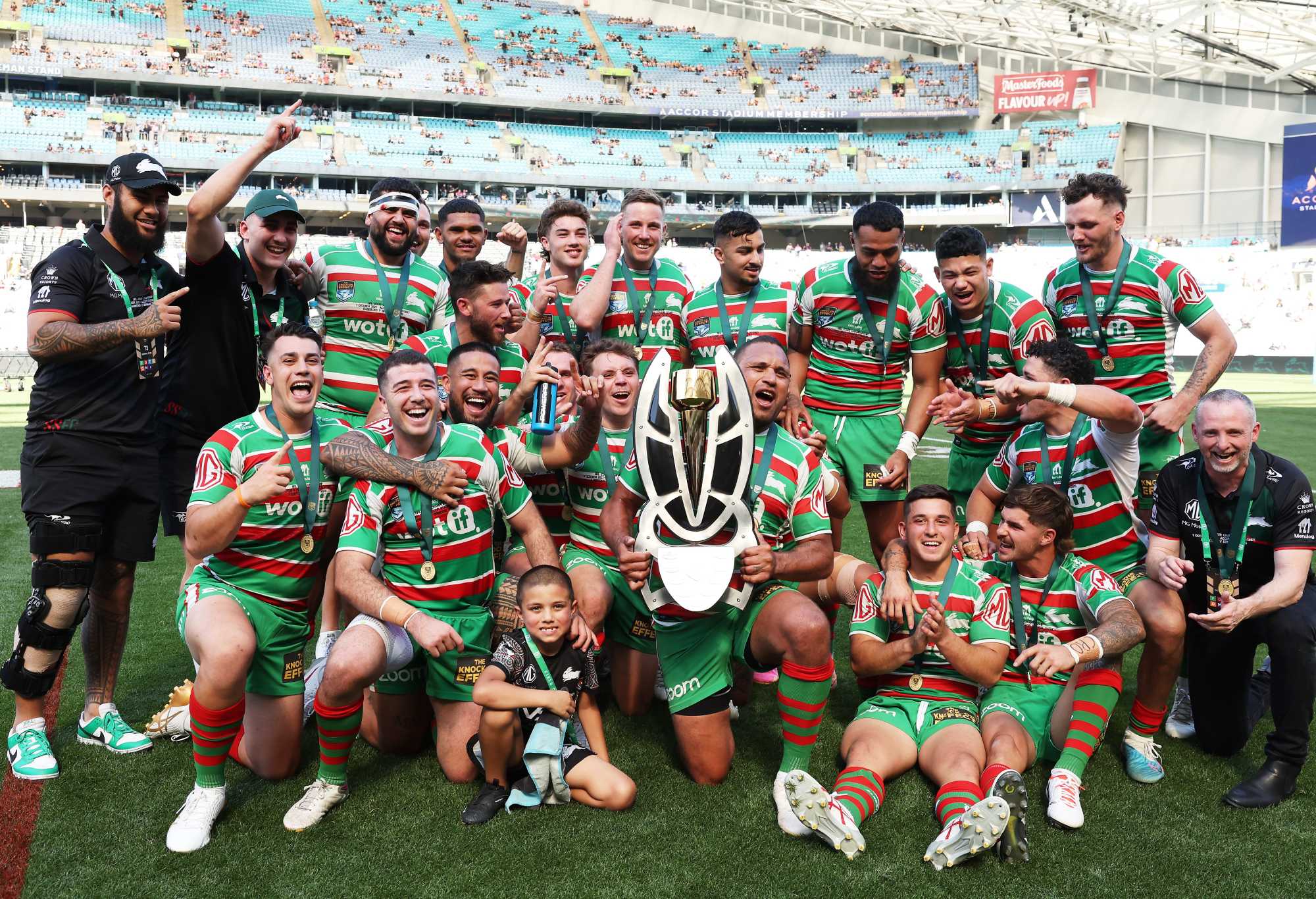 SYDNEY, AUSTRALIA - OCTOBER 01: The Rabbitohs celebrate victory with the NRL State Championship trophy during the 2023 NRL State Championship Grand Final match between South Sydney Rabbitohs and Brisbane Tigers at Accor Stadium, on October 01, 2023, in Sydney, Australia. (Photo by Matt King/Getty Images)