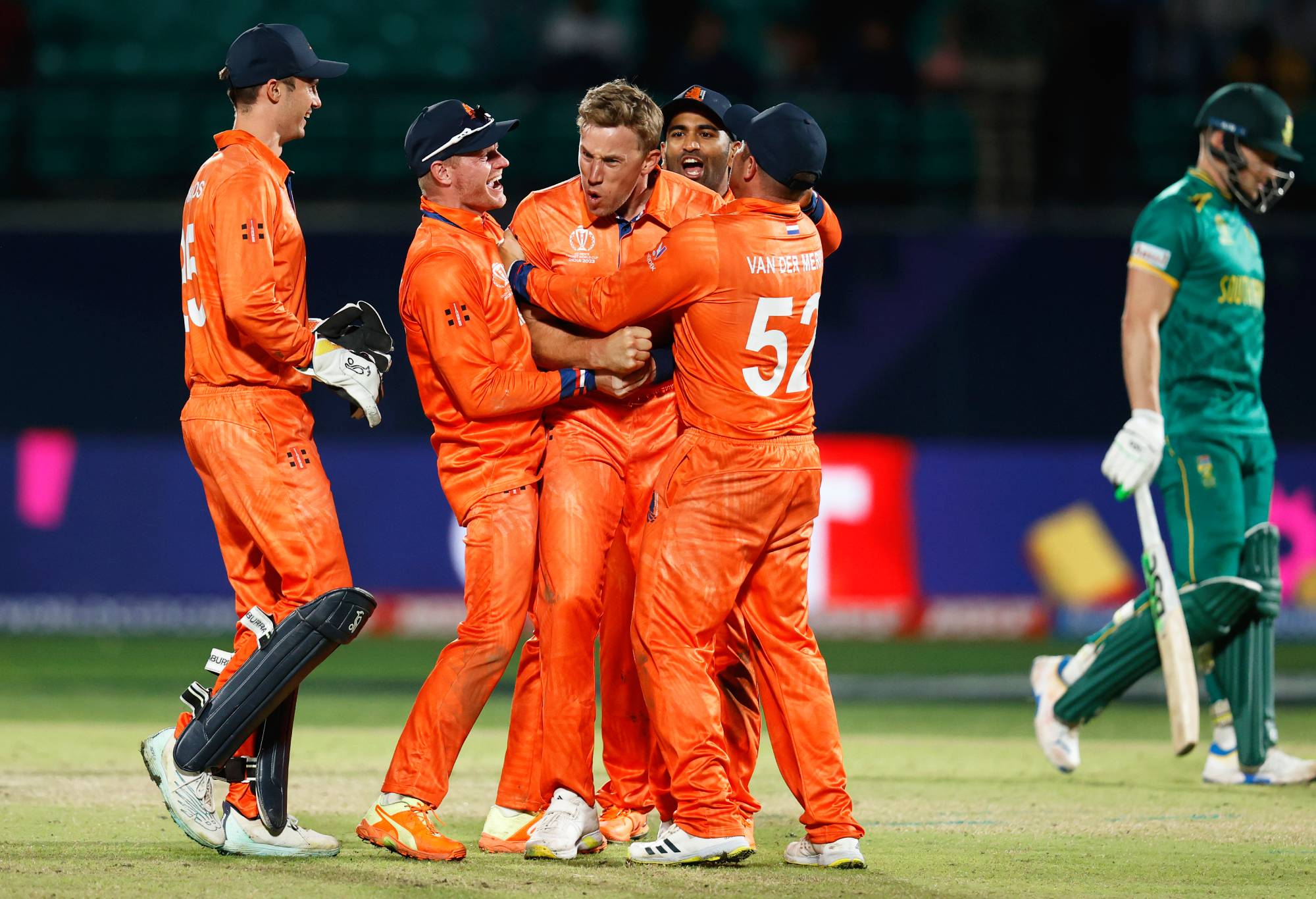 DHARAMSALA, INDIA - OCTOBER 17: Logan van Beek of Netherlands celebrates the wicket of David Miller of South Africa during the ICC Men's Cricket World Cup India 2023 between South Africa and Netherlands at HPCA Stadium on October 17, 2023 in Dharamsala, India. (Photo by Darrian Traynor-ICC/ICC via Getty Images)