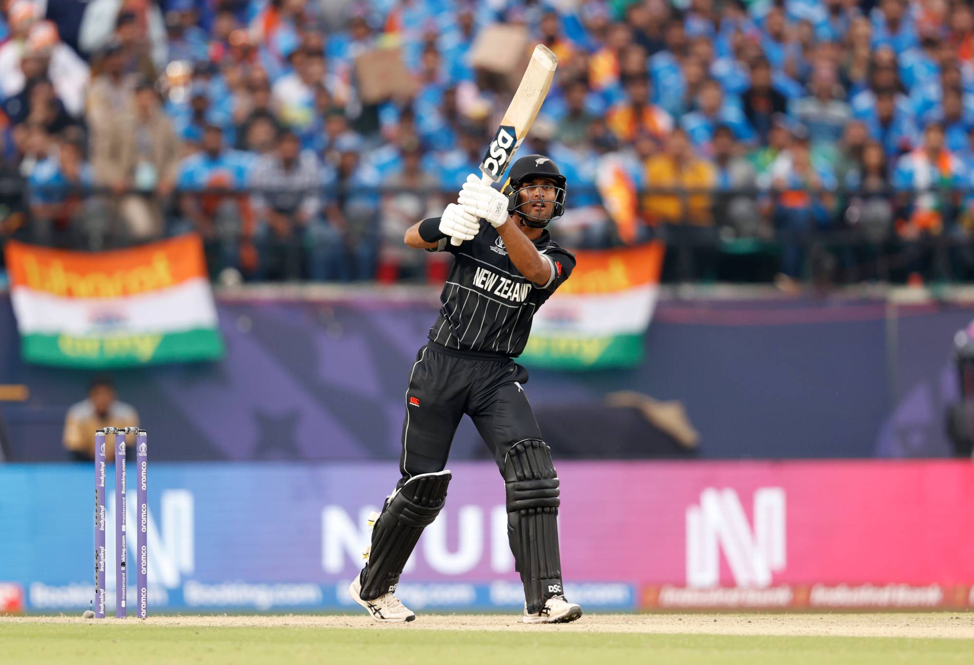 DHARAMSALA, INDIA - OCTOBER 22: Rachin Ravindra of New Zealand bats during the ICC Men's Cricket World Cup India 2023 match between India and New Zealand at HPCA Stadium on October 22, 2023 in Dharamsala, India. (Photo by Darrian Traynor-ICC/ICC via Getty Images)