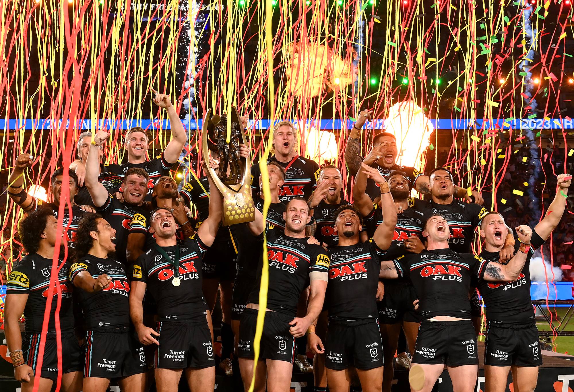 SYDNEY, AUSTRALIA - OCTOBER 01: Panthers celebrate with the trophy during the 2023 NRL Grand Final match between Penrith Panthers and Brisbane Broncos at Accor Stadium on October 01, 2023 in Sydney, Australia. (Photo by Bradley Kanaris/Getty Images)