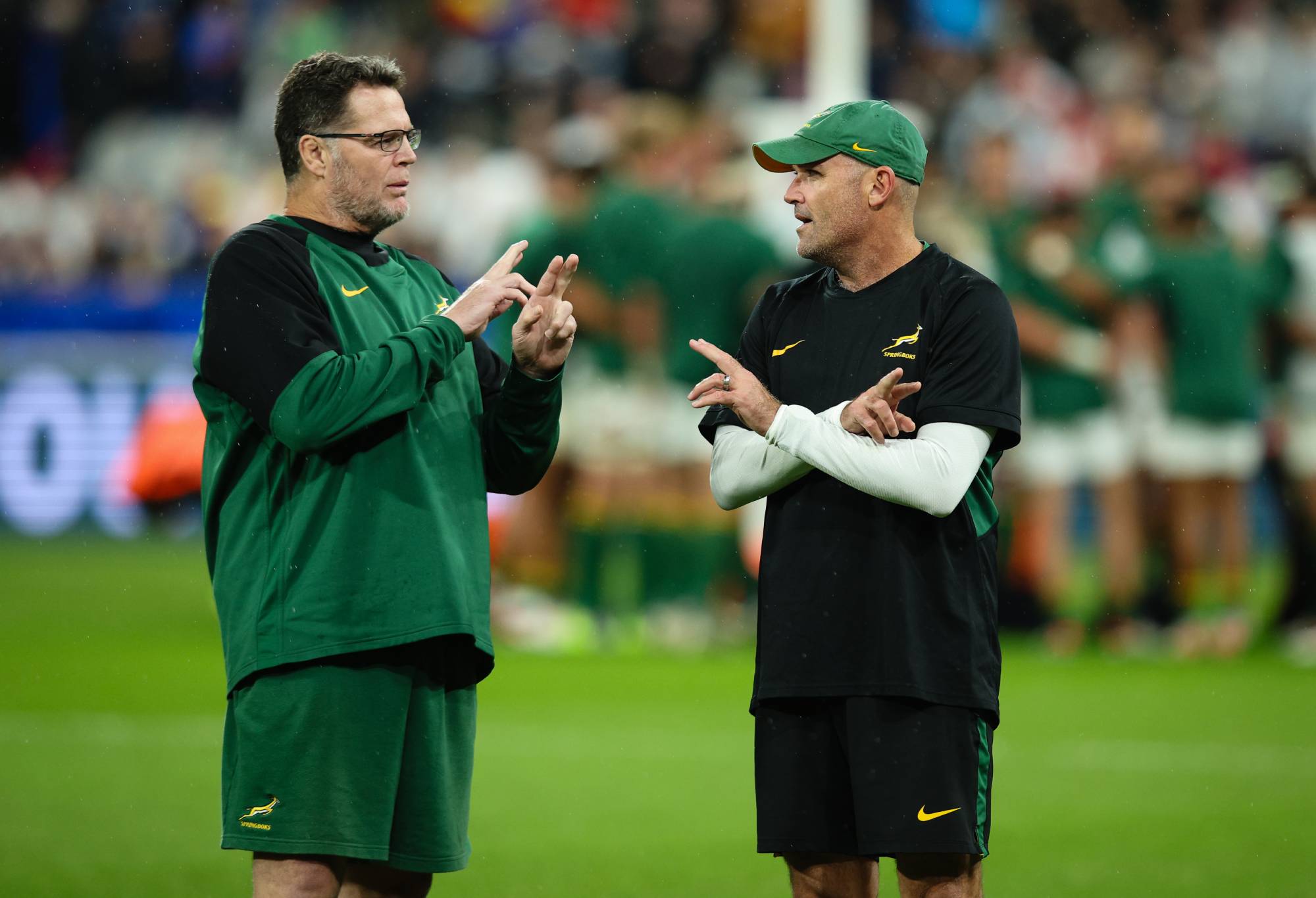 South Africa Director of Rugby Rassie Erasmus talks to South Africa Head Coach Jacques Nienaber during the pre match warm up ahead of the Rugby World Cup France 2023 match between England and South Africa at Stade de France on October 21, 2023 in Paris, France. (Photo by Craig Mercer/MB Media/Getty Images)