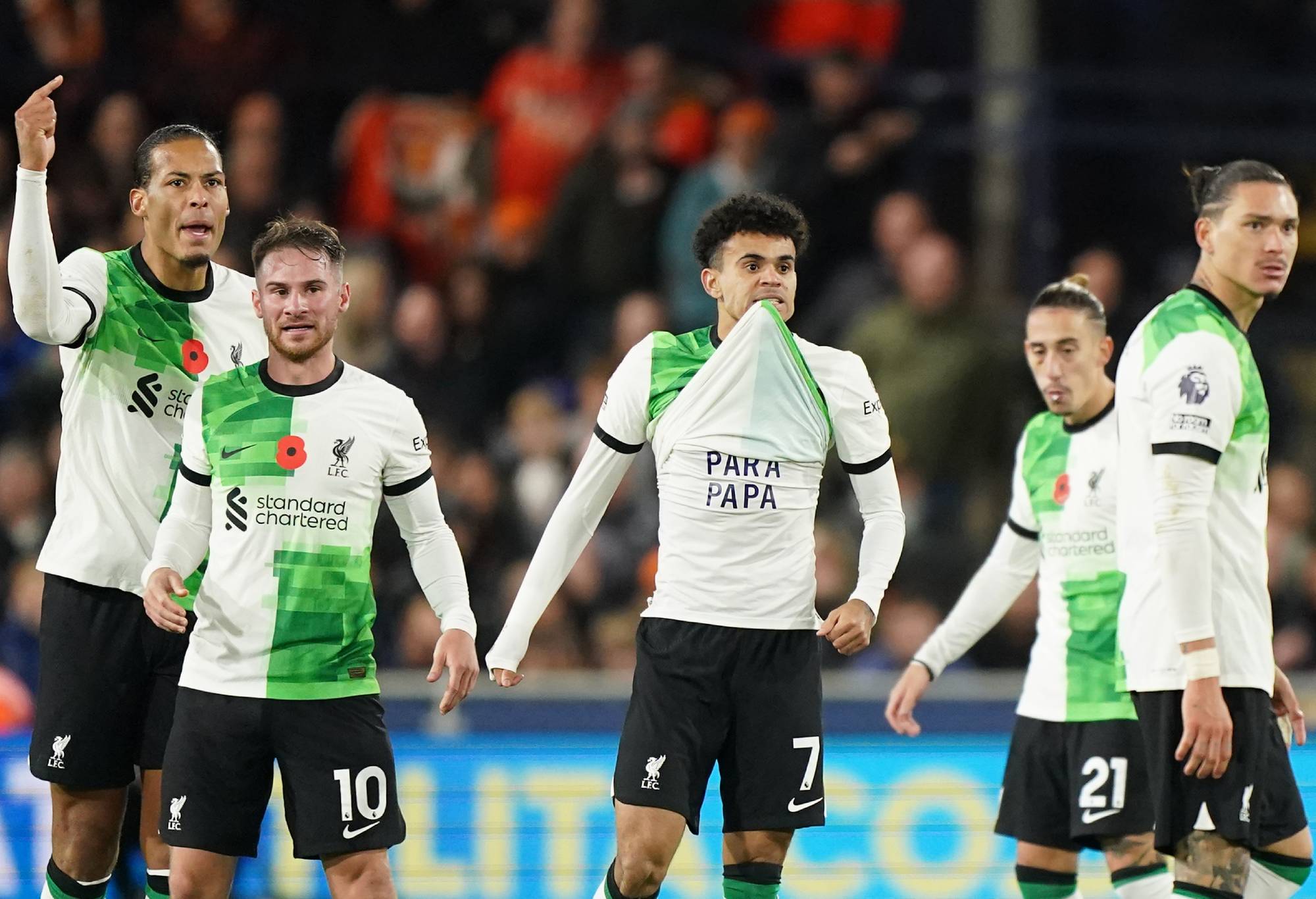 Liverpool's Luis Diaz (centre) celebrates scoring their side's first goal of the game by unveiling a shirt that reads (translated to English) 'Freedom for Dad' during the Premier League match at Kenilworth Road, Luton. Picture date: Sunday November 5, 2023. (Photo by Zac Goodwin/PA Images via Getty Images)