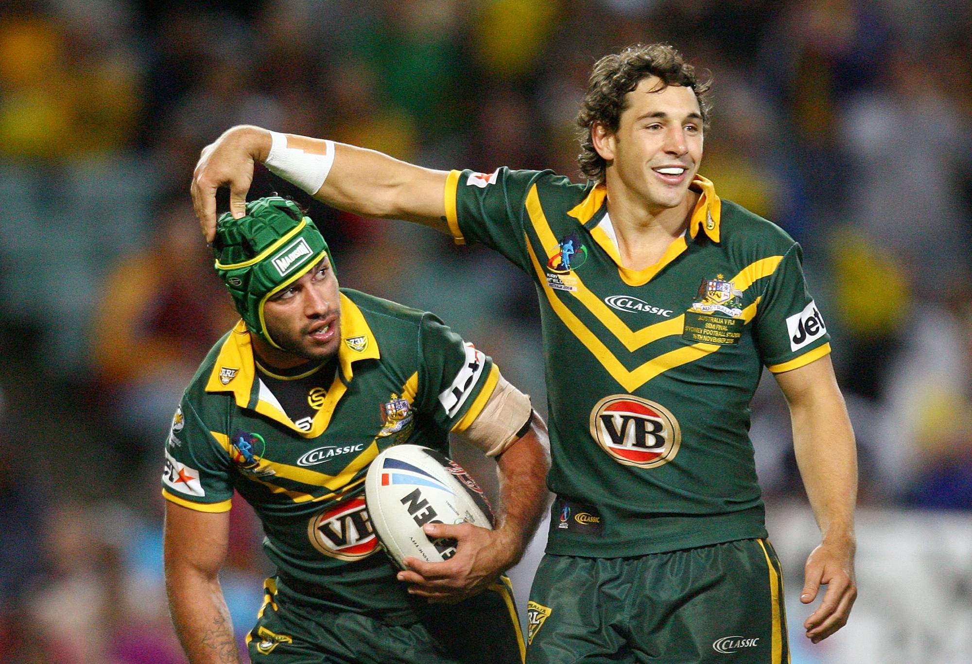 SYDNEY, AUSTRALIA - NOVEMBER 16: (L to R) Johnathan Thurston of Australia is congratulated by team mate Billy Slater after he scored during the 2008 Rugby League World Cup Semi Final match between the Australian Kangaroos and Fiji at the Sydney Football Stadium on November 16, 2008 in Sydney, Australia. (Photo by Mark Nolan/Getty Images)
