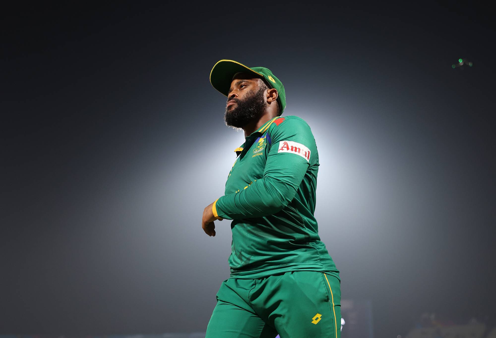 Temba Bavuma of South Africa walks off the field following defeat in the ICC Men's Cricket World Cup India 2023 Semi Final match between South Africa and Australia at Eden Gardens on November 16, 2023 in Kolkata, India. (Photo by Matthew Lewis-ICC/ICC via Getty Images)