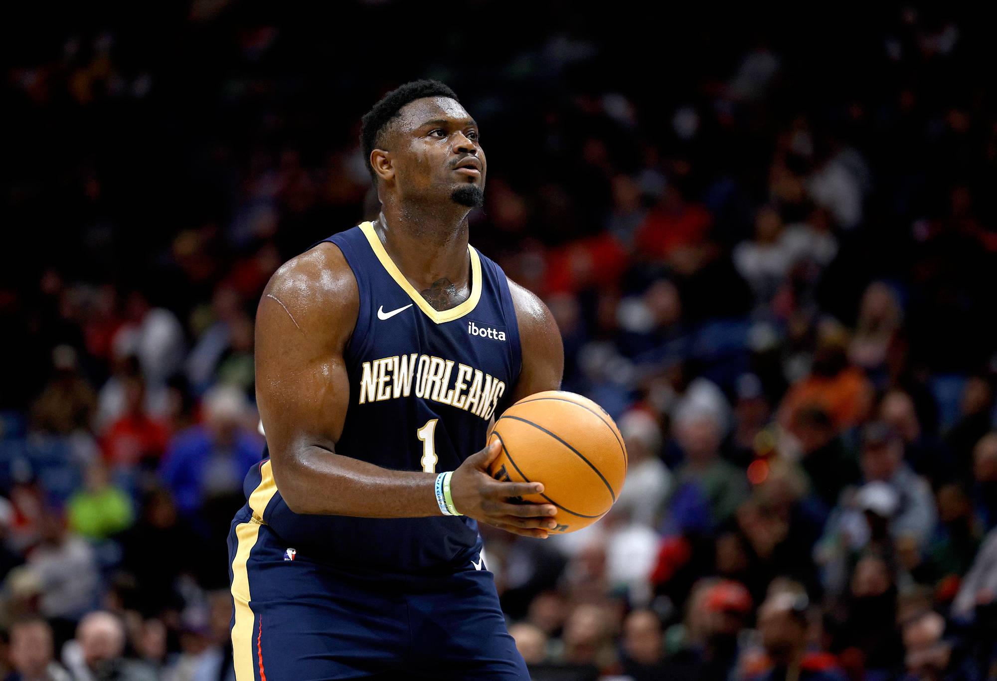 NEW ORLEANS, LOUISIANA - NOVEMBER 29: Zion Williamson #1 of the New Orleans Pelicans shoots a free throw during the fourth quarter of an NBA game at Smoothie King Center on November 29, 2023 in New Orleans, Louisiana. NOTE TO USER: User expressly acknowledges and agrees that, by downloading and or using this photograph, User is consenting to the terms and conditions of the Getty Images License Agreement. (Photo by Sean Gardner/Getty Images)
