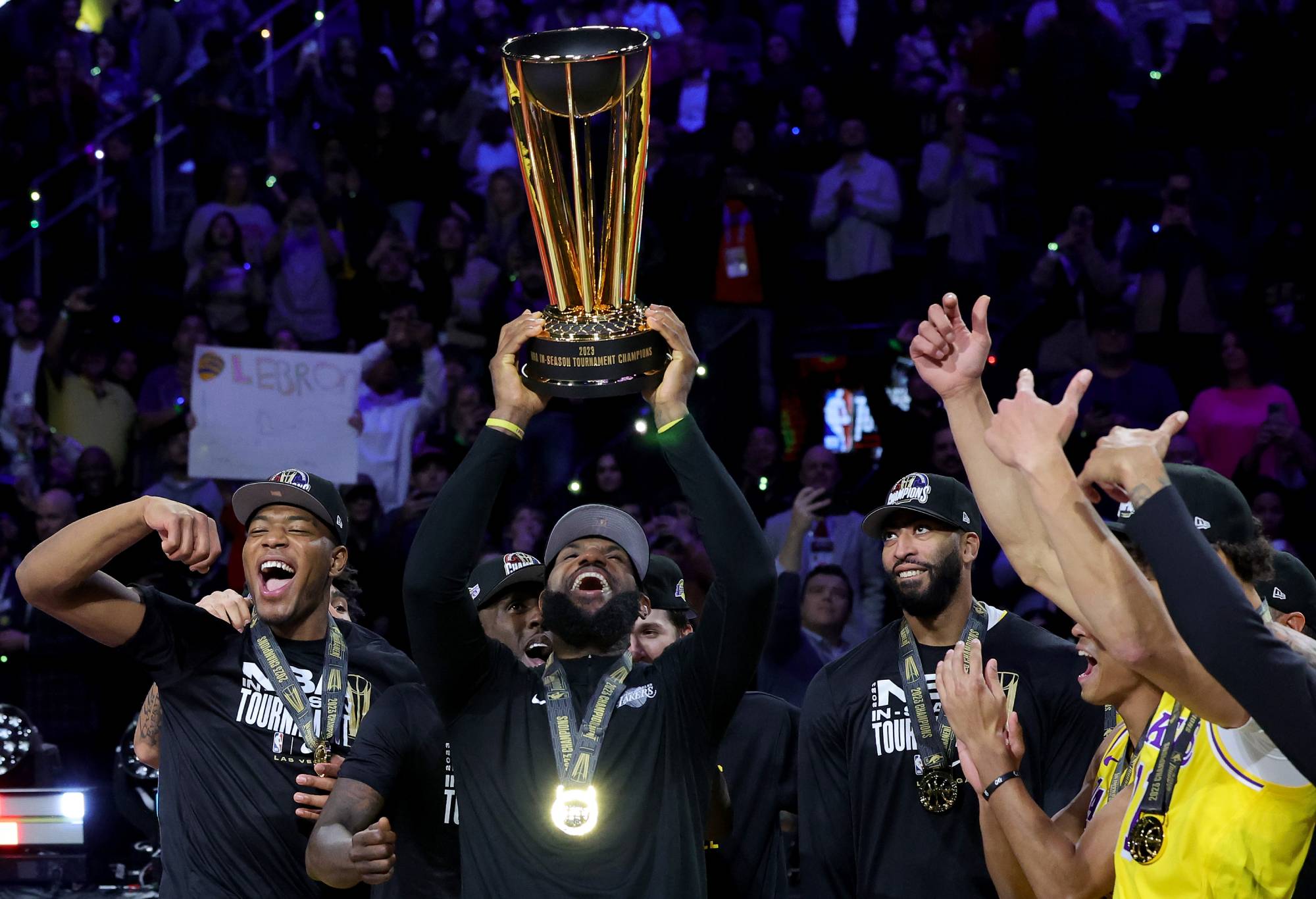 LAS VEGAS, NEVADA - DECEMBER 09: LeBron James #23 of the Los Angeles Lakers hoists the trophy with his teammates after winning the championship game of the inaugural NBA In-Season Tournament at T-Mobile Arena on December 09, 2023 in Las Vegas, Nevada. NOTE TO USER: User expressly acknowledges and agrees that, by downloading and or using this photograph, User is consenting to the terms and conditions of the Getty Images License Agreement. (Photo by Ethan Miller/Getty Images)