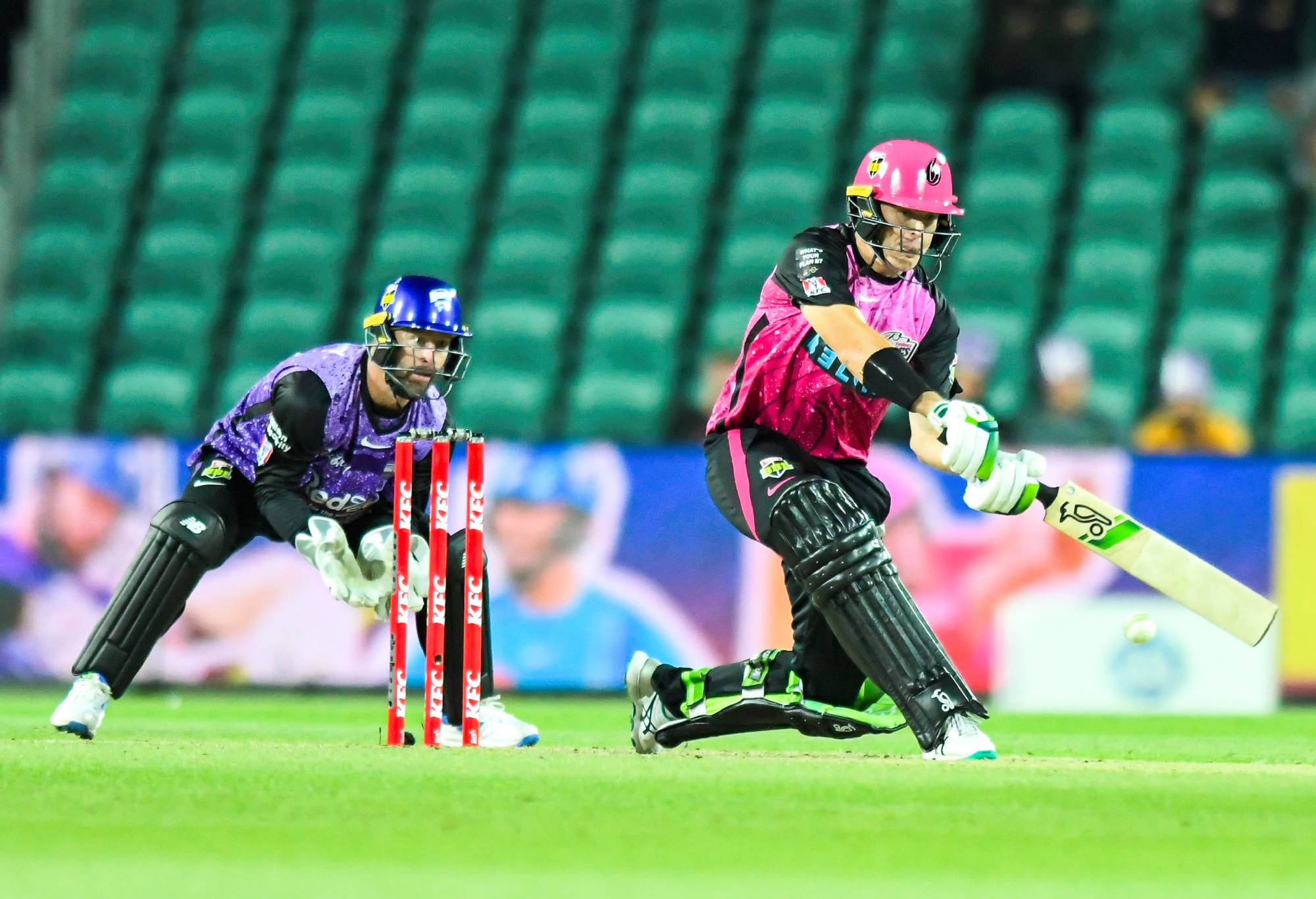 LAUNCESTON, AUSTRALIA - DECEMBER 11: Daniels Hughes of the Sixers pulls a ball to the boundary during the BBL match between Hobart Hurricanes and Sydney Sixers at University of Tasmania Stadium, on December 11, 2023, in Launceston, Australia. (Photo by Simon Sturzaker/Getty Images)