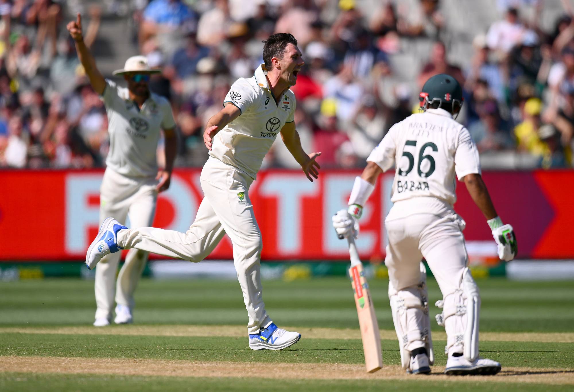MELBOURNE, AUSTRALIA - DECEMBER 27: Pat Cummins of Australia celebrates the wicket of Babar Azam of Pakistan during day two of the Second Test Match between Australia and Pakistan at Melbourne Cricket Ground on December 27, 2023 in Melbourne, Australia. (Photo by Morgan Hancock - CA/Cricket Australia via Getty Images)