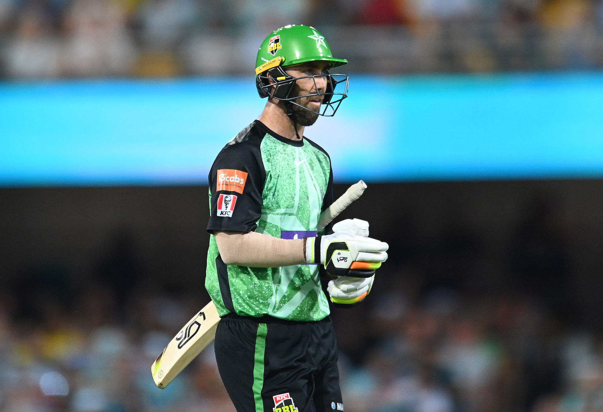 Glenn Maxwell of the Stars leaves the field after getting caught