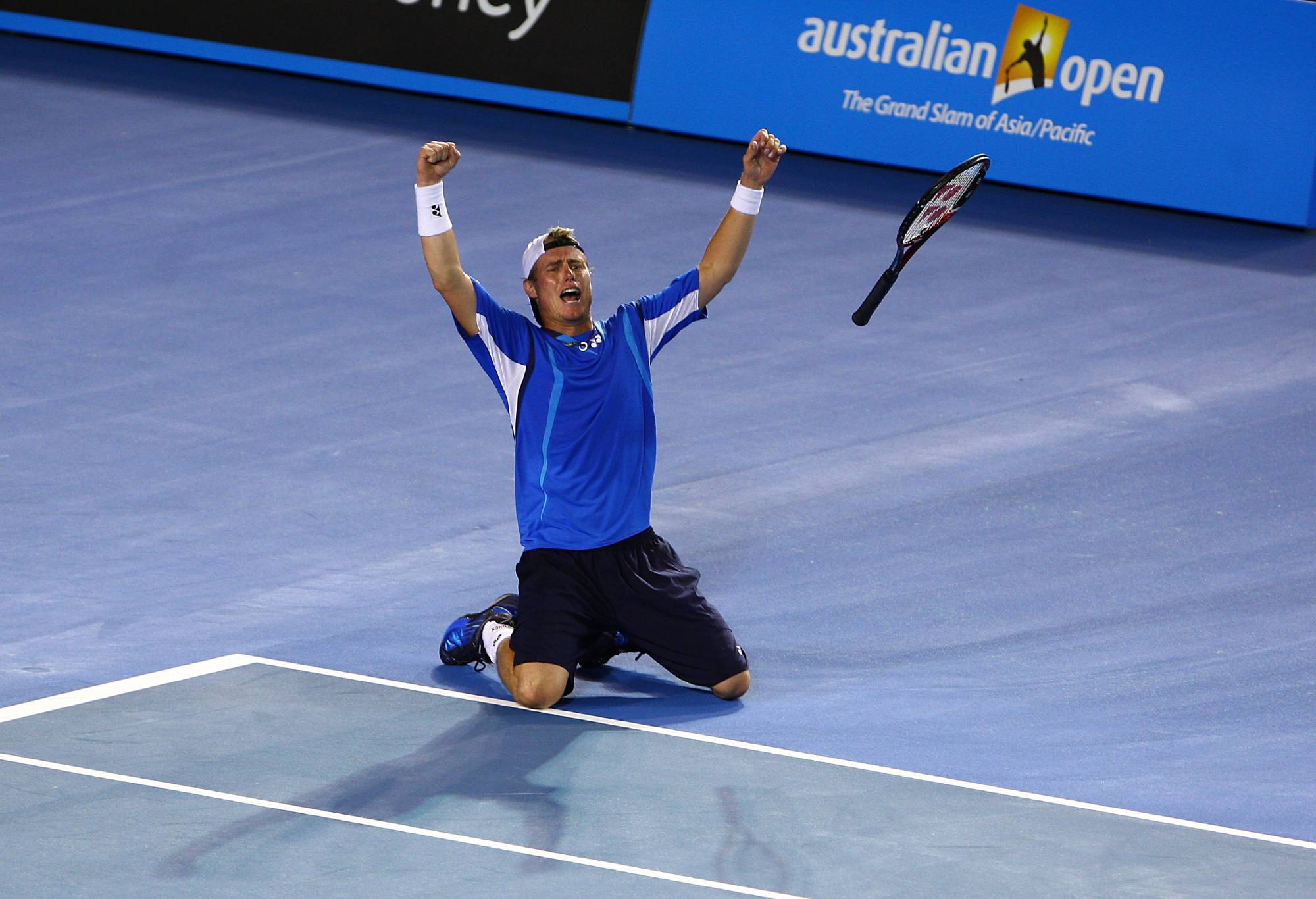 Lleyton Hewitt celebrates defeating Marcos Baghdatis in 5 sets playing past 4:30 am in the morning on day six of the Australian Open (Photo by Jon Buckle - PA Images via Getty Images)