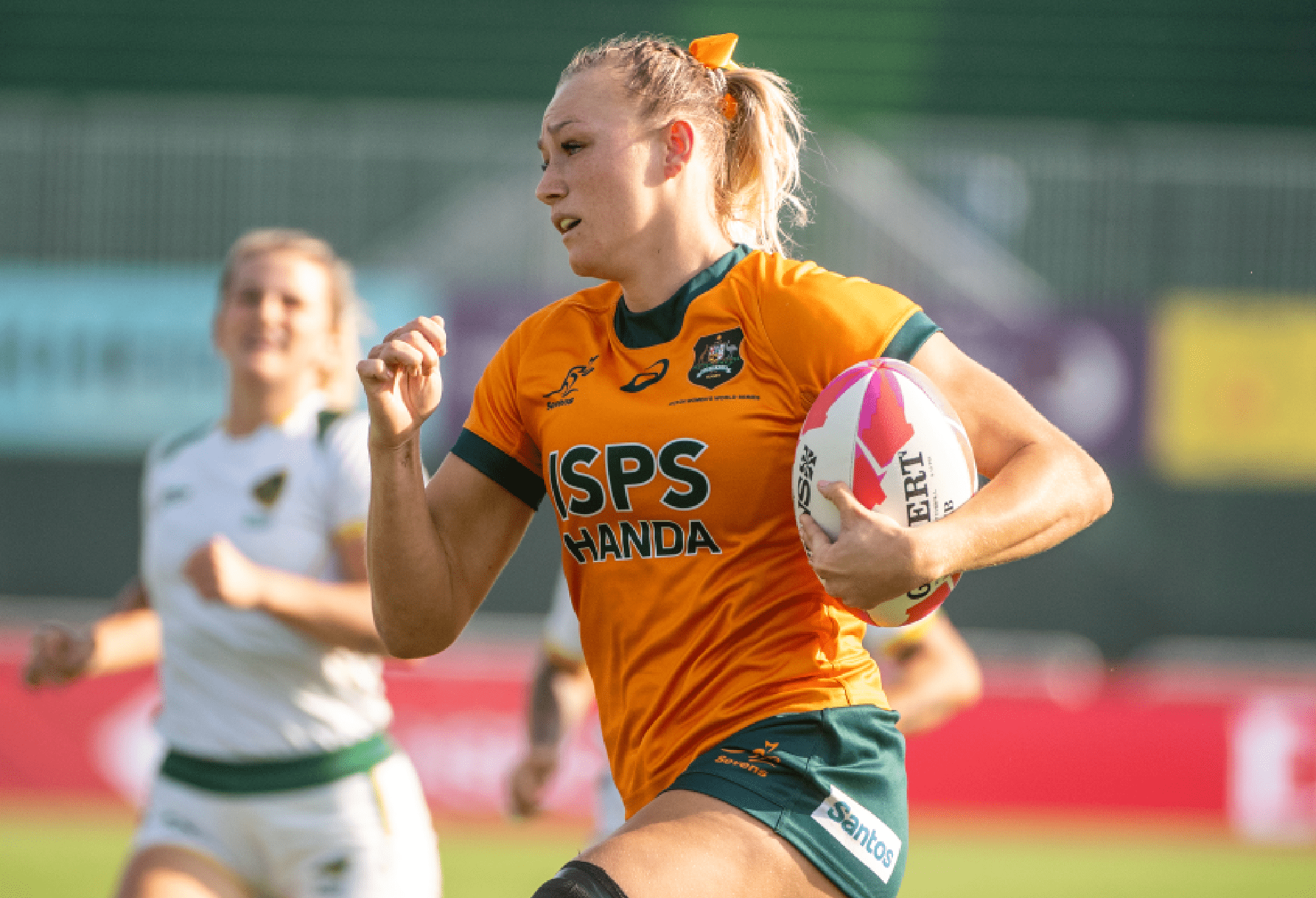 Maddison Levi of Australia runs with the ball to score a try against Brazil during the HSBC SVNS rugby tournament on December 2, 2023 in Dubai, United Arab Emirates. (Photo by Martin Dokoupil/Getty Images)