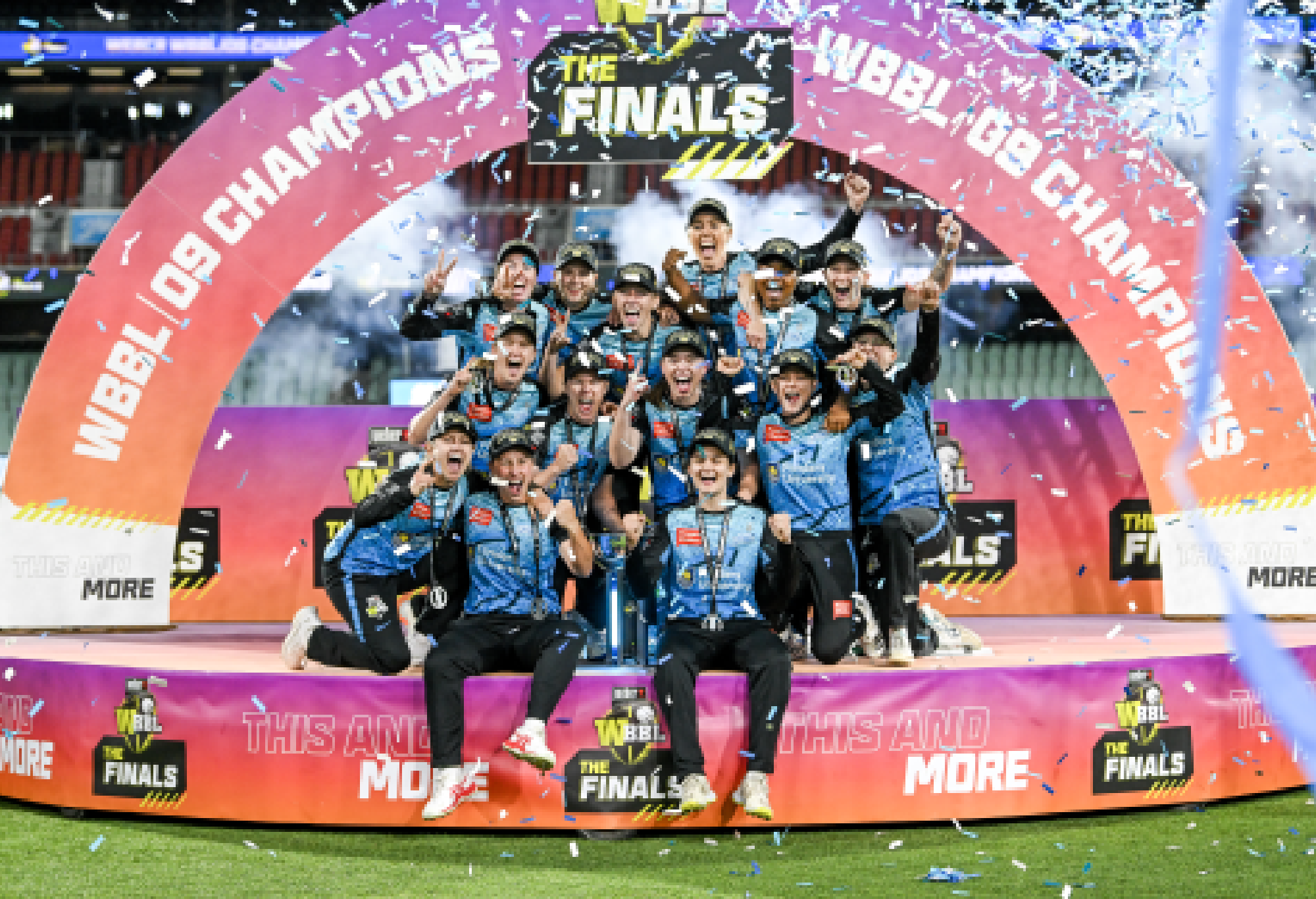 The Strikers celebrate on the podium after winning the WBBL Final match between Adelaide Strikers and Brisbane Heat at Adelaide Oval, on December 02, 2023, in Adelaide, Australia. (Photo by Mark Brake - CA/Cricket Australia via Getty Images)