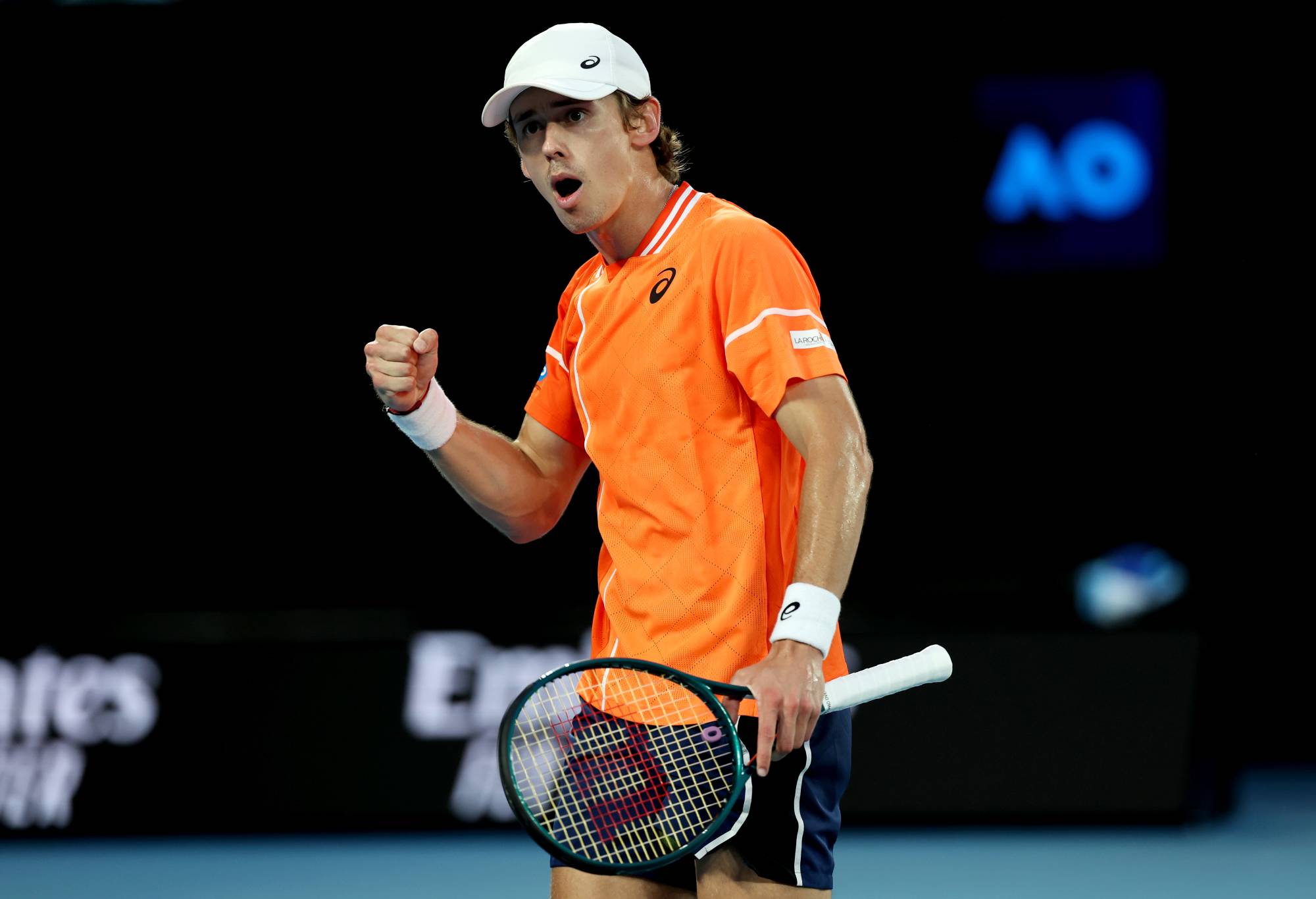 Alex de Minaur of Australia celebrates a point in their round one singles match against Milos Raonic of Canada during the 2024 Australian Open at Melbourne Park on January 15, 2024 in Melbourne, Australia. (Photo by Cameron Spencer/Getty Images)