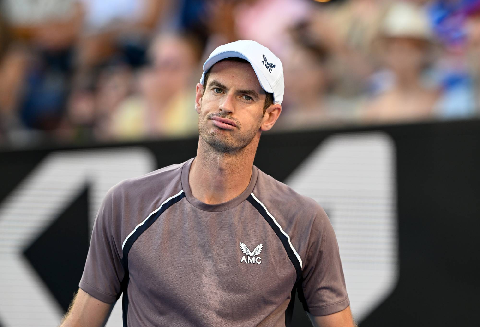 Andy Murray of Great Britain reacts in his round one singles match against Tomas Martin Etcheverry of Argentina during the 2024 Australian Open at Melbourne Park on January 15, 2024 in Melbourne, Australia. (Photo by Will Murray/Getty Images)