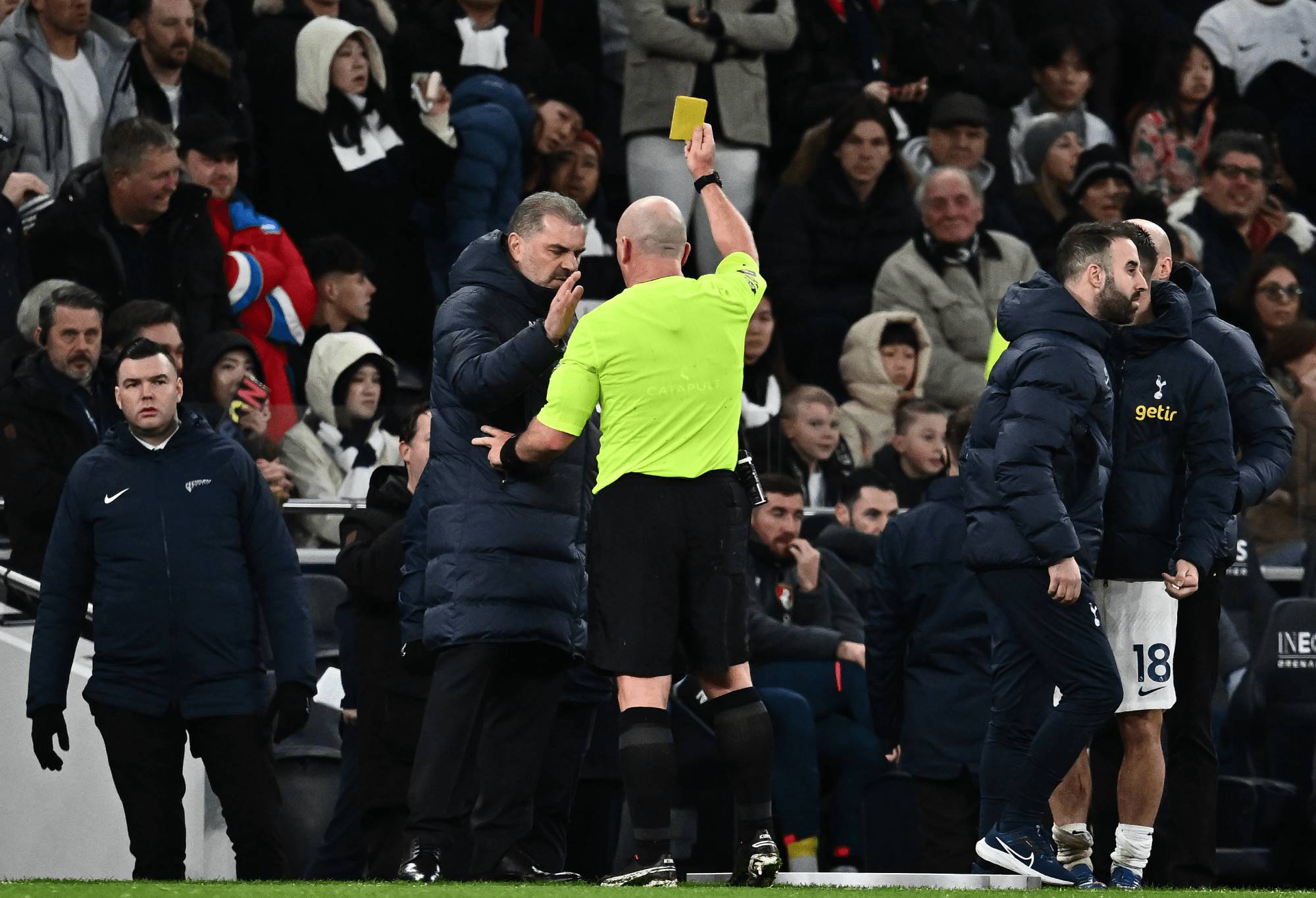 Ange Postecoglou Manager of Tottenham Hotspur receives a yellow card during the Premier League match between Tottenham Hotspur and AFC Bournemouth at Tottenham Hotspur Stadium on December 31, 2023 in London, England. (Photo by Sebastian Frej/MB Media/Getty Images)