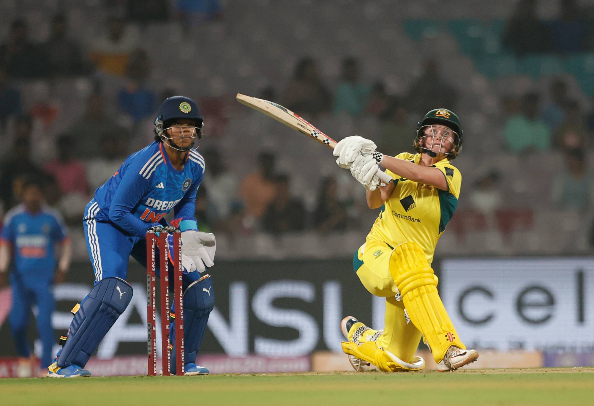 NAVI MUMBAI, INDIA - JANUARY 5: Beth Mooney of Australia plays a shot during game one of the women's T20I series between India and Australia at DY Patil Stadium on January 5, 2024 in Navi Mumbai, India. (Photo by Pankaj Nangia/Getty Images)