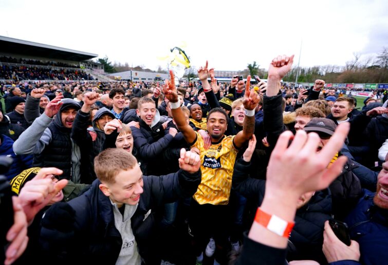 Maidstone United's Liam Sole celebrates on the pitch with fans at the end of the Emirates FA Cup Third Round match at the Gallagher Stadium, Maidstone. Picture date: Saturday January 6, 2024. (Photo by Zac Goodwin/PA Images via Getty Images)