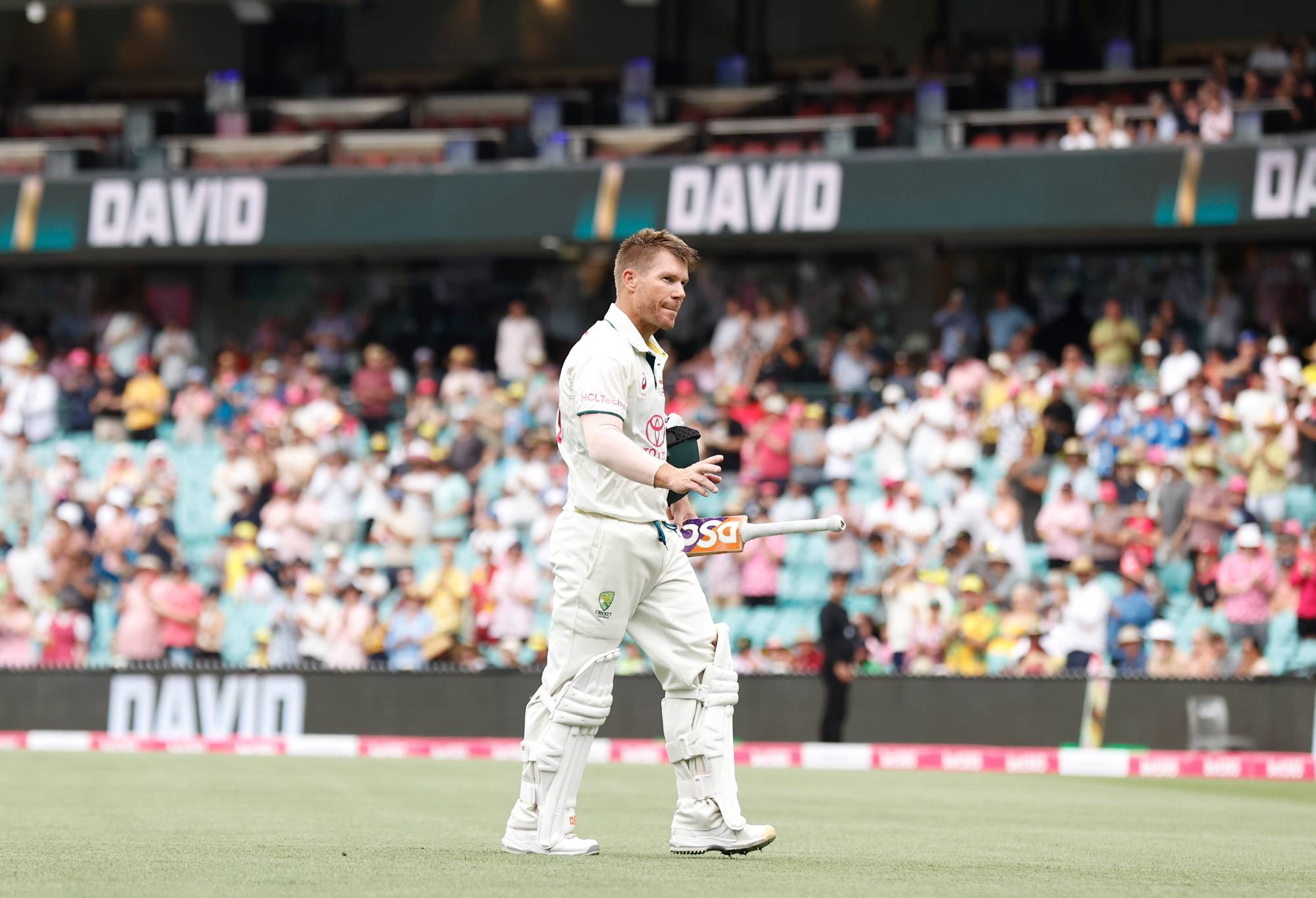 SYDNEY, AUSTRALIA - JANUARY 04: David Warner of Australia walks off the field after being dismissed by Agha Salman of Pakistan during day two of the Men's Third Test Match in the series between Australia and Pakistan at Sydney Cricket Ground on January 04, 2024 in Sydney, Australia. (Photo by Darrian Traynor/Getty Images)