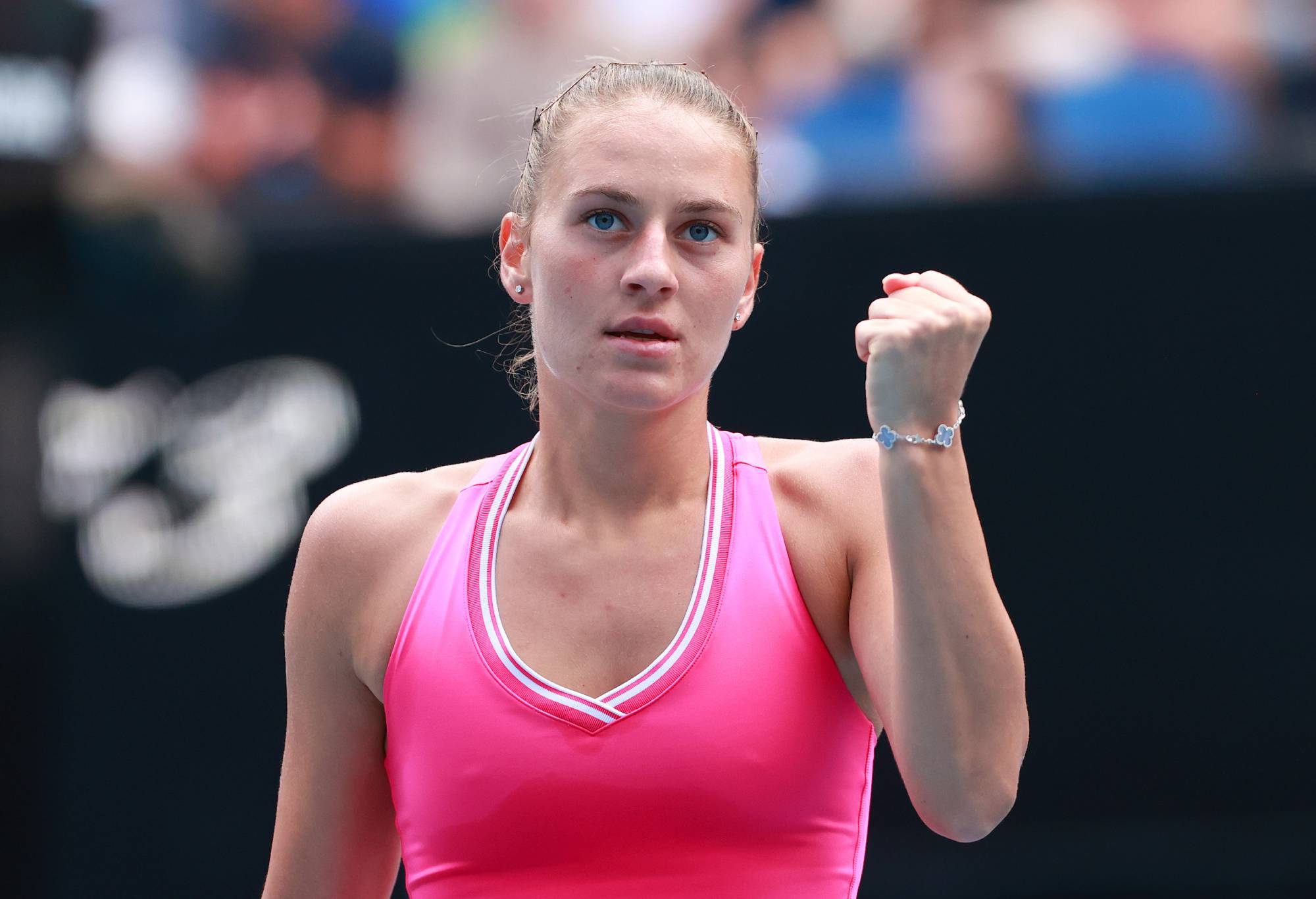 MELBOURNE, AUSTRALIA - JANUARY 21: Marta Kostyuk of Ukraine celebrates a point in their round four singles match against Maria Timofeeva during the 2024 Australian Open at Melbourne Park on January 21, 2024 in Melbourne, Australia. (Photo by Kelly Defina/Getty Images)