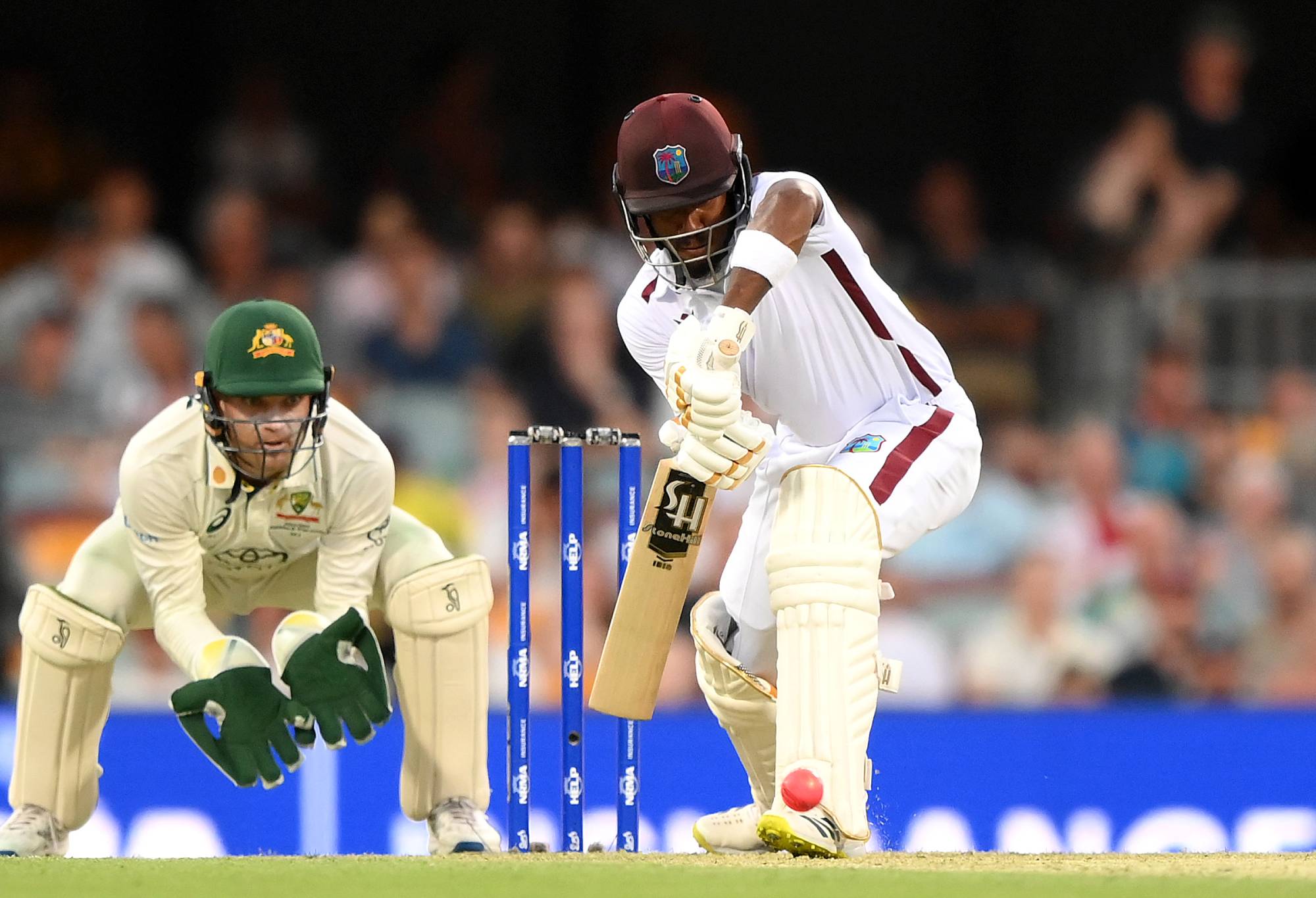 BRISBANE, AUSTRALIA - JANUARY 25: Kavem Hodge of the West Indies plays a shot during day one of the Second Test match in the series between Australia and West Indies at The Gabba on January 25, 2024 in Brisbane, Australia. (Photo by Bradley Kanaris/Getty Images)