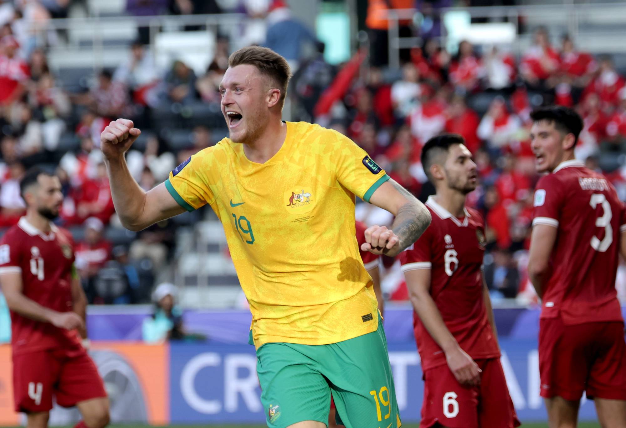 Harry Souttar of Australia celebrates after scoring his team's fourth goal during the AFC Asian Cup Round of 16 match between Australia and Indonesia at Jassim Bin Hamad Stadium on January 28, 2024 in Doha, Qatar. (Photo by Lintao Zhang/Getty Images)