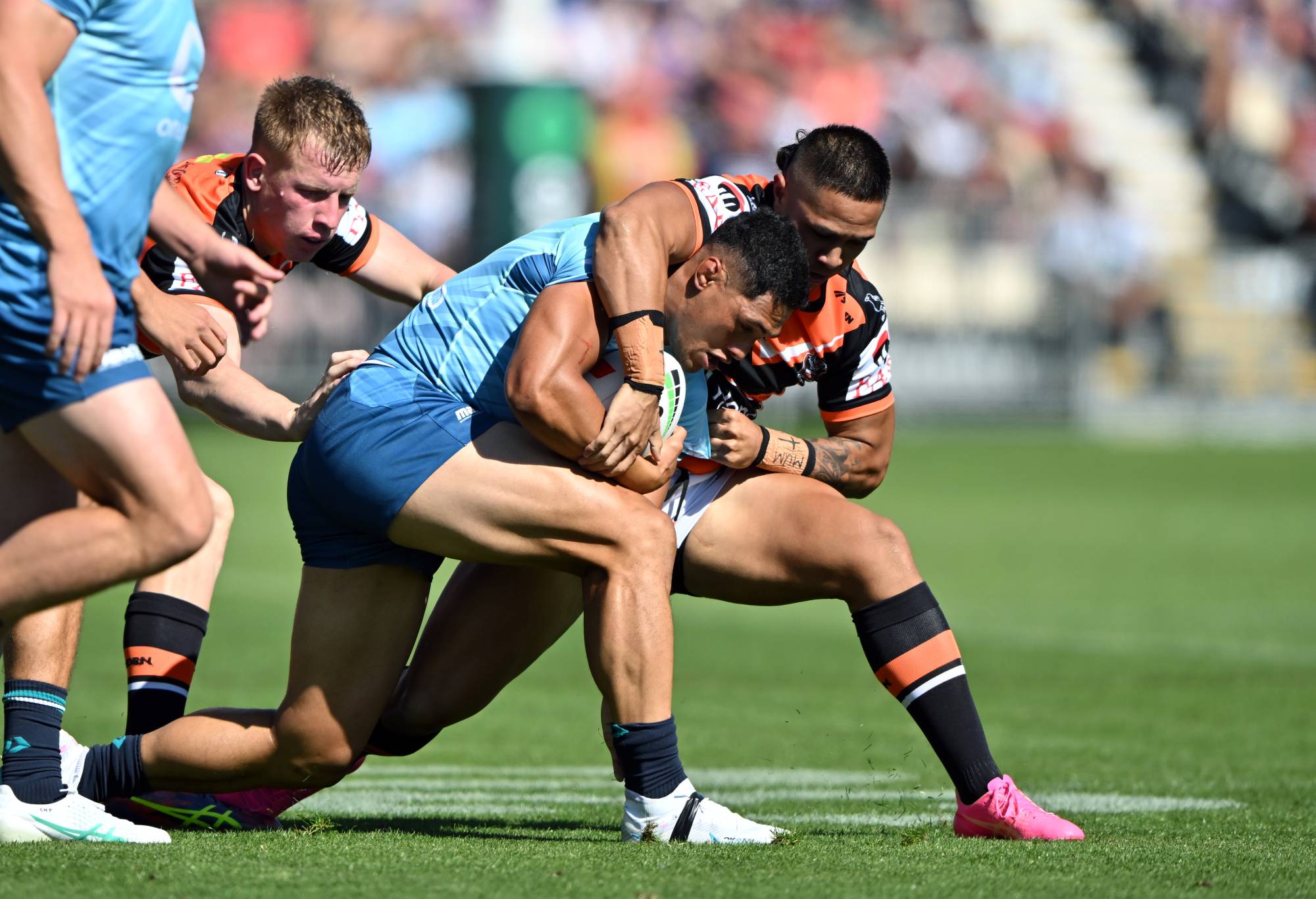 Roger Tuivasa-Sheck is tackled. (Photo by Kai Schwoerer/Getty Images)
