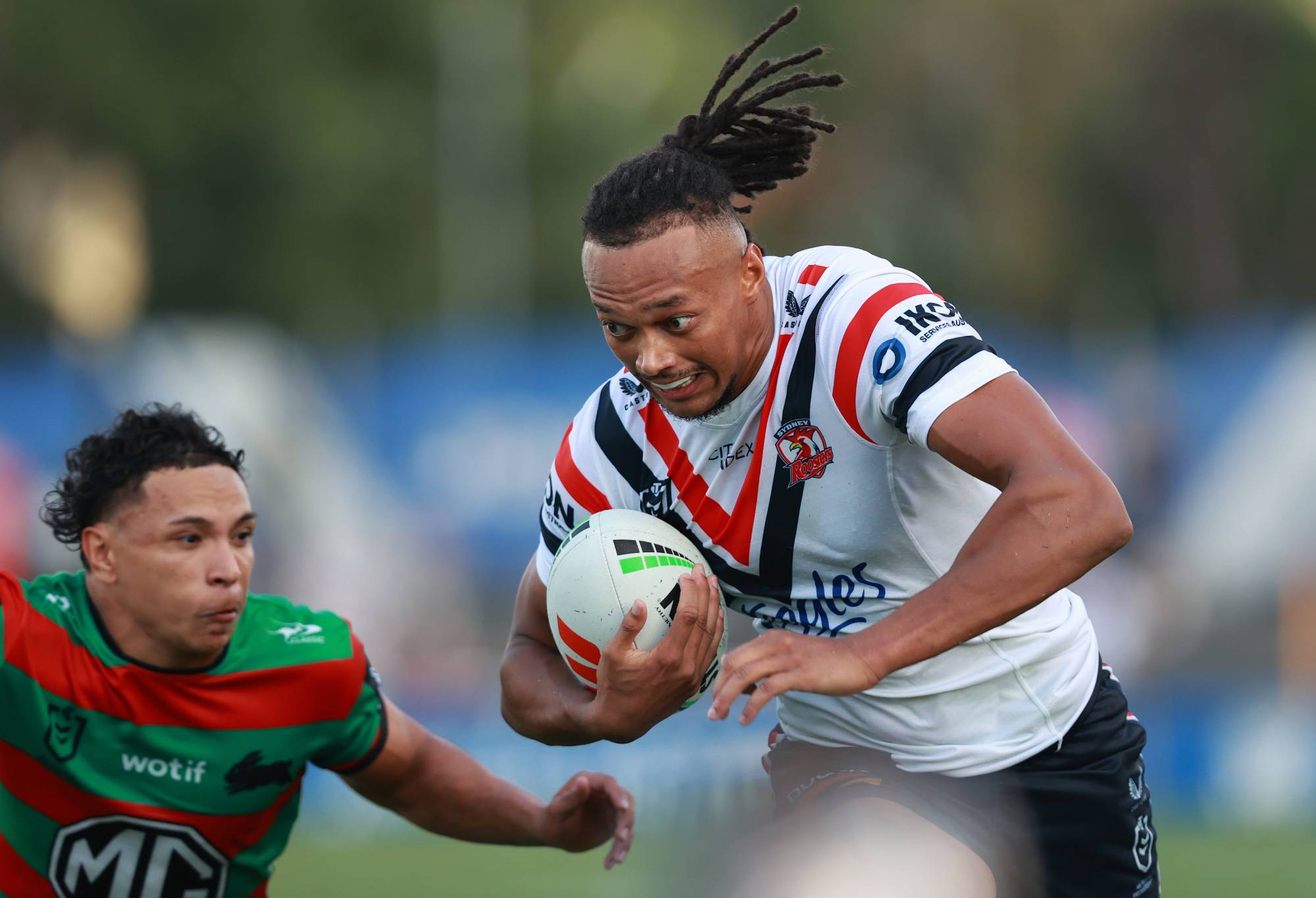 SYDNEY, AUSTRALIA - FEBRUARY 23: Alex Young of the Roosters runs the ball during the NRL Pre-season challenge match between South Sydney Rabbitohs and Sydney Roosters at Belmore Sports Ground on February 23, 2024 in Sydney, Australia. (Photo by Jason McCawley/Getty Images)