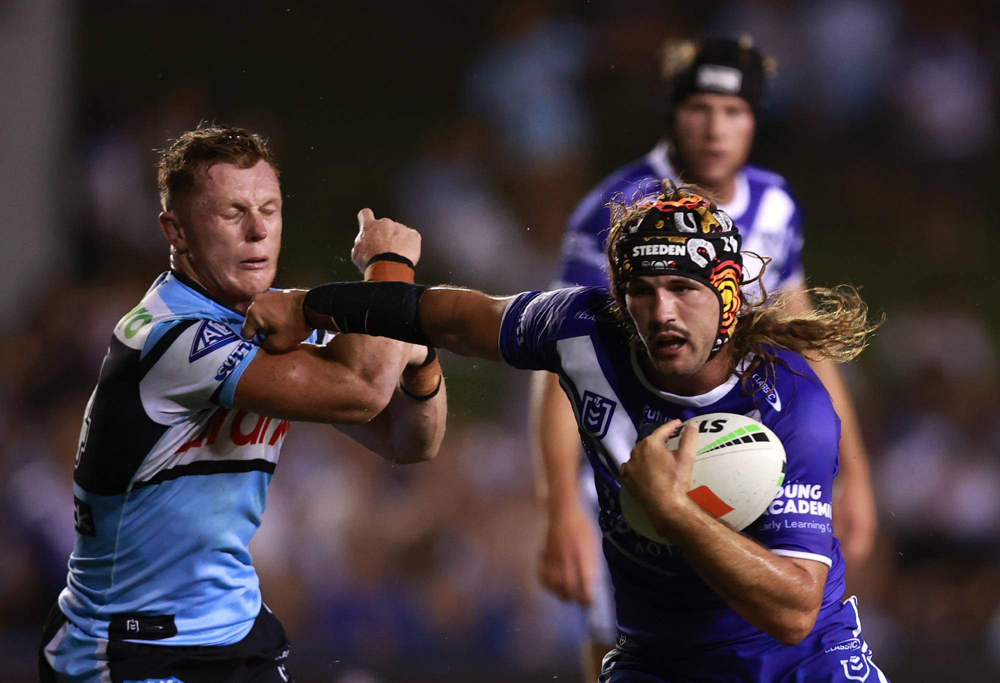 SYDNEY, AUSTRALIA - FEBRUARY 23: Josh Curran of the Bulldogs runs the ball during the NRL Pre-season challenge match between Cronulla Sharks and Canterbury Bulldogs at Belmore Sports Ground on February 23, 2024 in Sydney, Australia. (Photo by Jason McCawley/Getty Images)