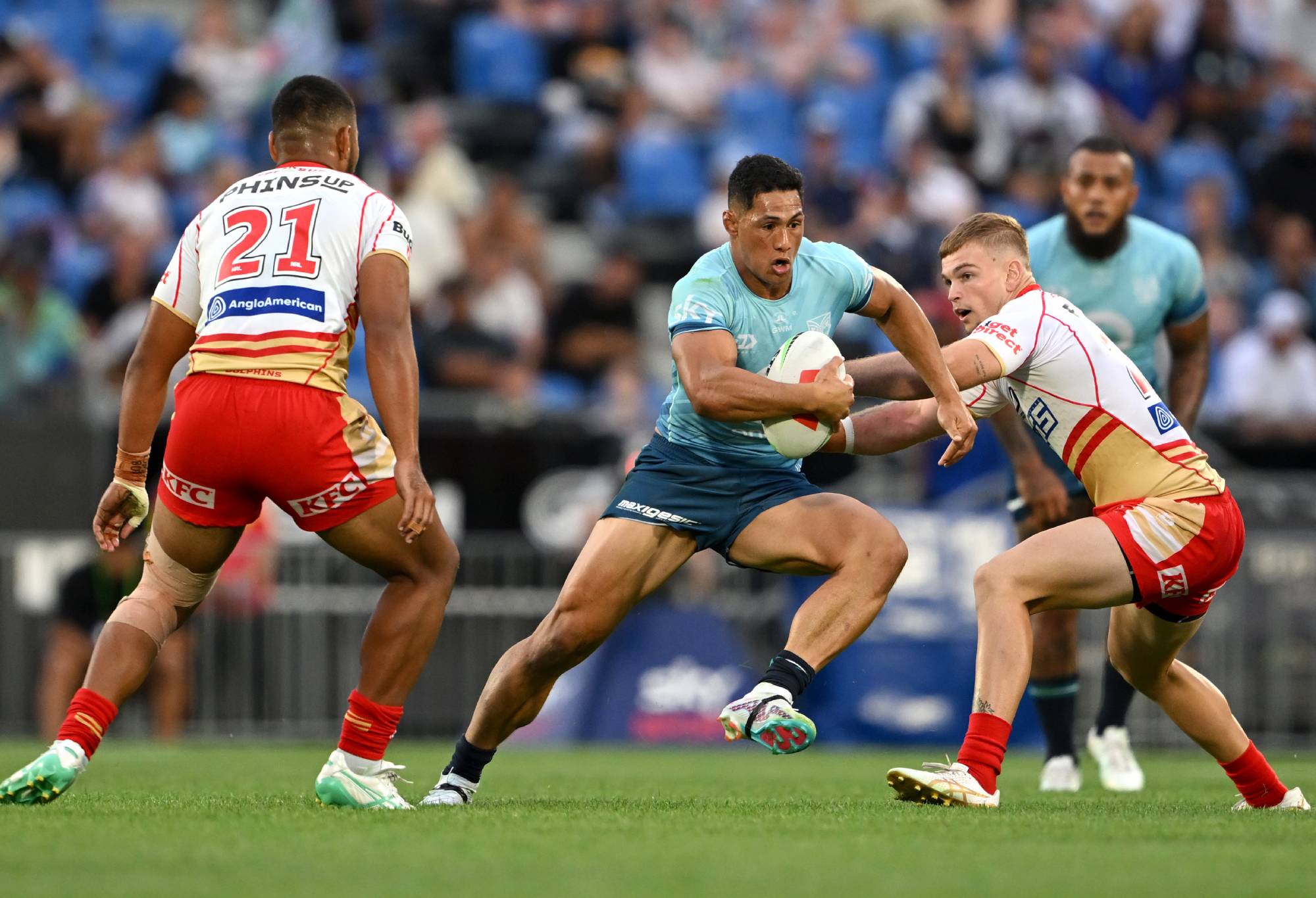 AUCKLAND, NEW ZEALAND - FEBRUARY 24: Roger Tuivasa-Sheck of the Warriors charges forward during the NRL Pre-season challenge match between New Zealand Warriors and Dolphins at Go Media Stadium Mt Smart on February 24, 2024 in Auckland, New Zealand. (Photo by Hannah Peters/Getty Images)