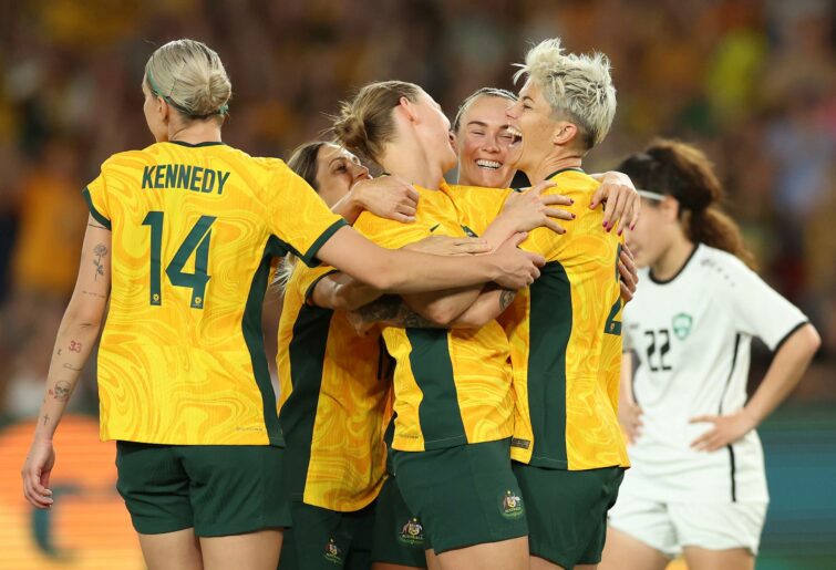 MELBOURNE, AUSTRALIA - FEBRUARY 28: Michelle Heyman of Australia celebrates with team mates after scoring a goal during the AFC Women's Olympic Football Tournament Paris 2024 Asian Qualifier Round 3 match between Australia Matildas and Uzbekistan at Marvel Stadium on February 28, 2024 in Melbourne, Australia. (Photo by Robert Cianflone/Getty Images)