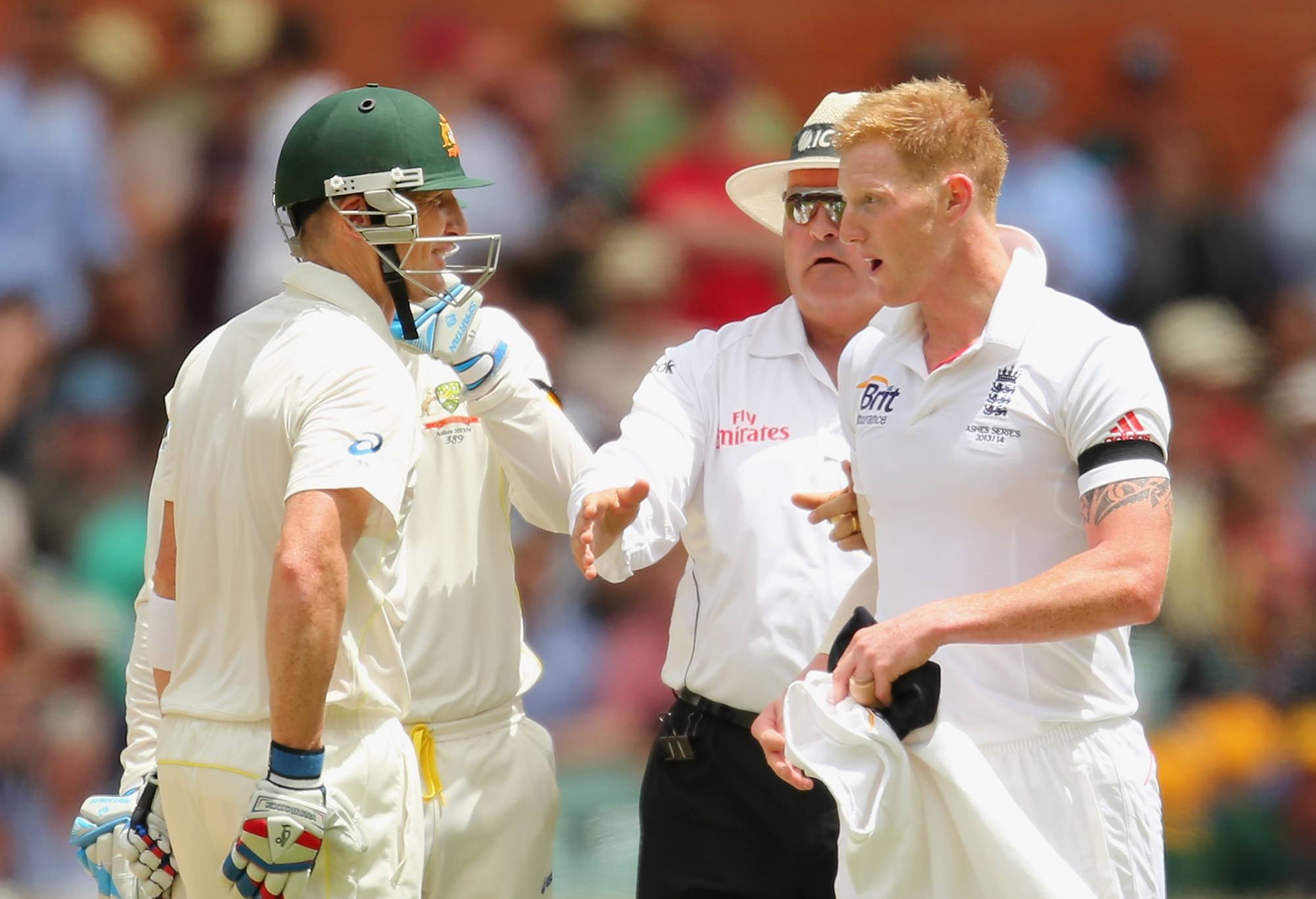 ADELAIDE, AUSTRALIA - DECEMBER 06: Brad Haddin of Australia and Ben Stokes of England exchange words as umpire Marais Erasmus steps between them during day two of the Second Ashes Test Match between Australia and England at Adelaide Oval on December 6, 2013 in Adelaide, Australia. (Photo by Scott Barbour/Getty Images)