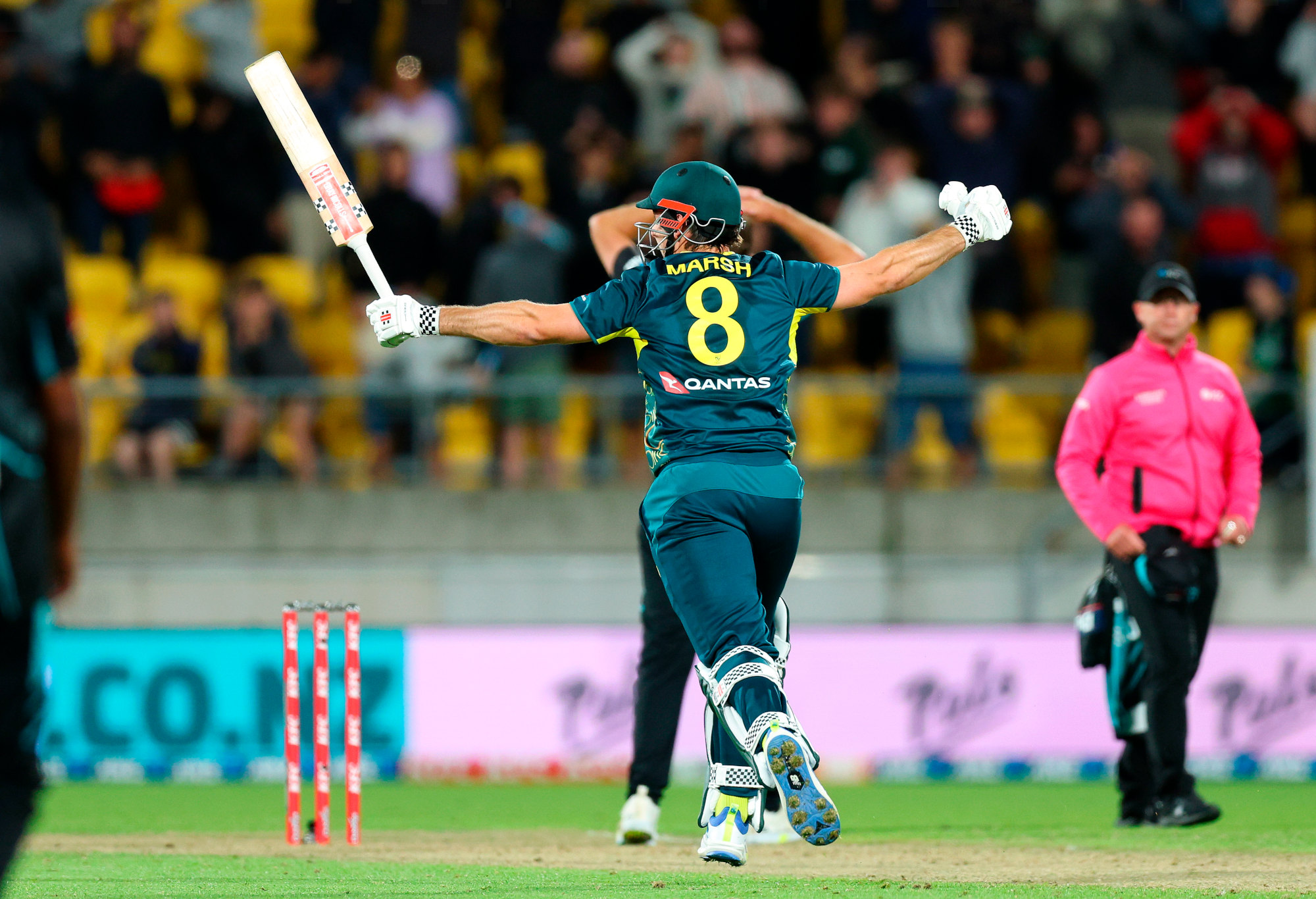 Mitchell Marsh celebrates Australia's win over New Zealand.