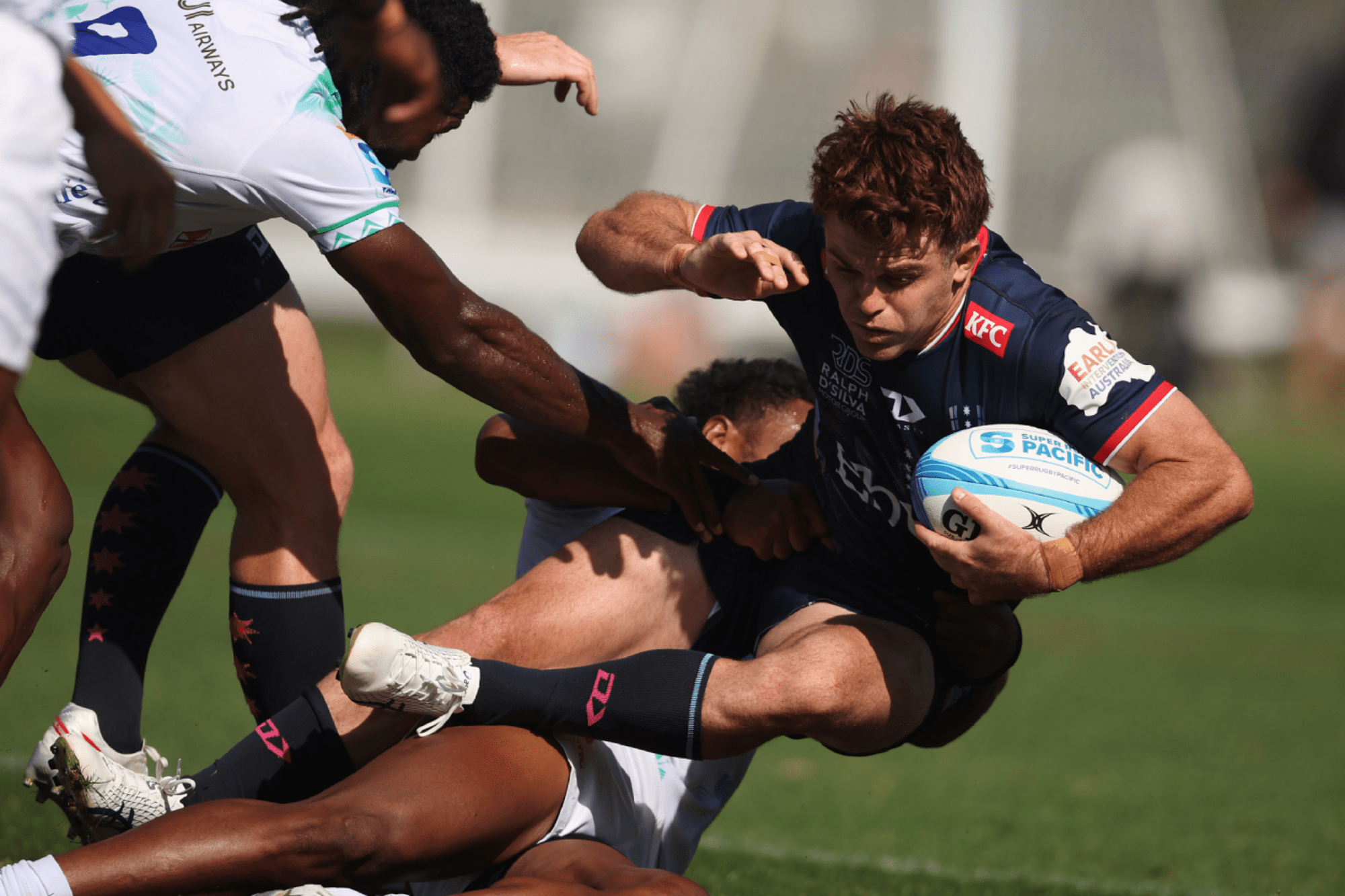 Andrew Kellaway of the Rebels is tackled during the Super Rugby Pacific Pre-Season Match between Melbourne Rebels and Fijian Drua at Gosch's Paddock on February 16, 2024 in Melbourne, Australia. (Photo by Daniel Pockett/Getty Images)