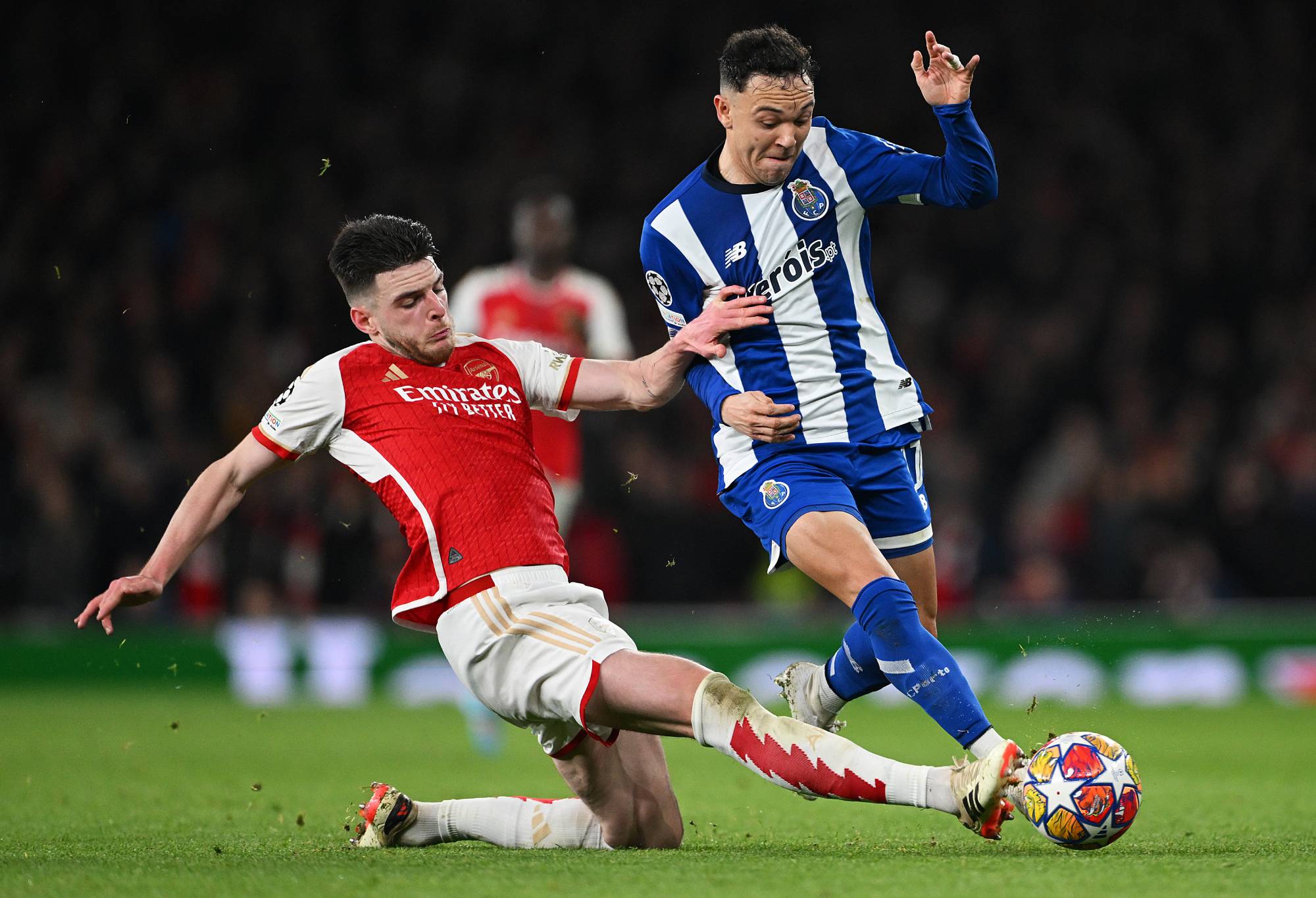 LONDON, ENGLAND - MARCH 12: Pepe of FC Porto is challenged by Declan Rice of Arsenal during the UEFA Champions League 2023/24 round of 16 second leg match between Arsenal FC and FC Porto at Emirates Stadium on March 12, 2024 in London, England.
