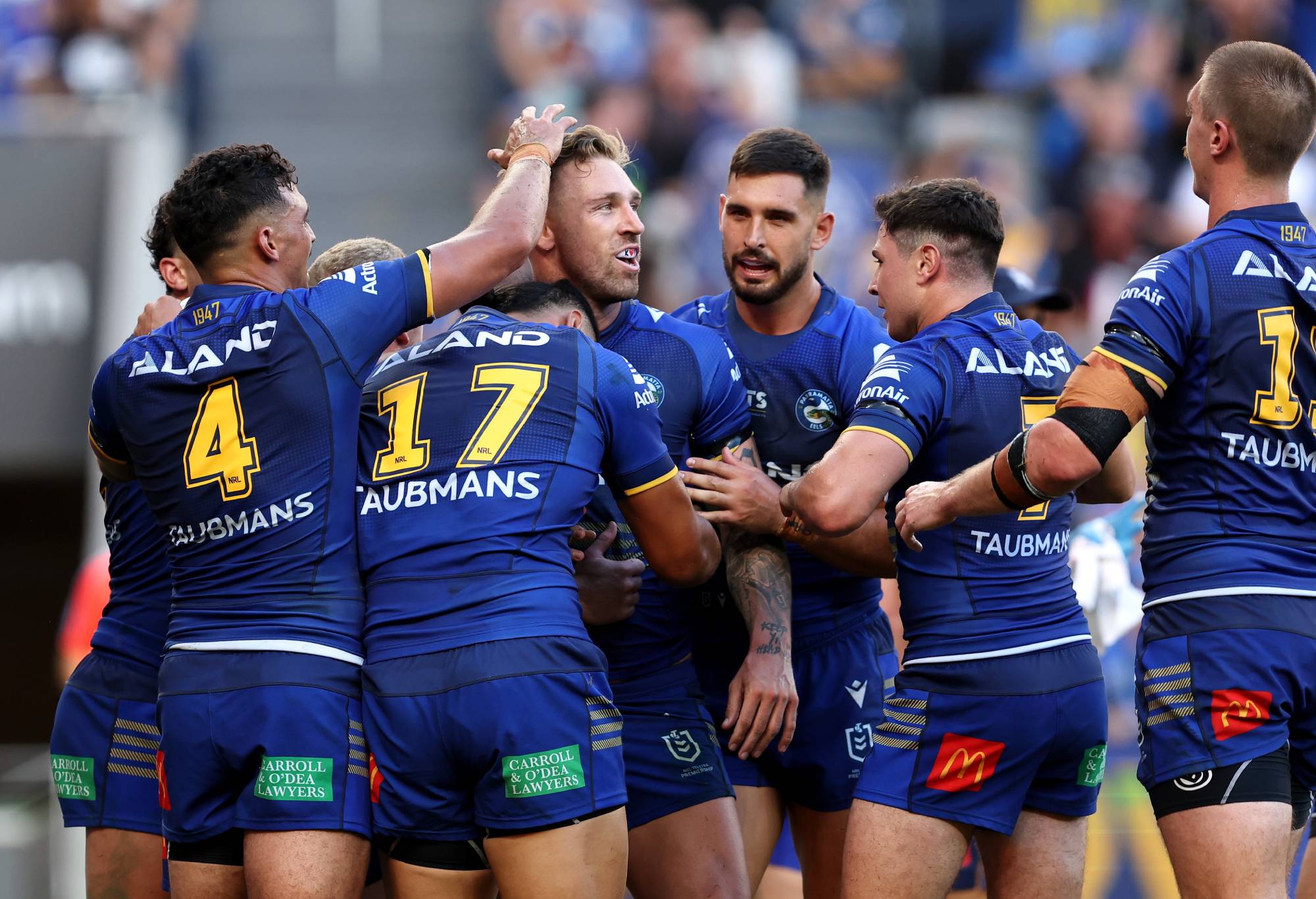 SYDNEY, AUSTRALIA - MARCH 09: Bryce Cartwright of the Eels celebrates celebrates with team mates after scoring a try during the round one NRL match between Parramatta Eels and Canterbury Bulldogs at CommBank Stadium, on March 09, 2024, in Sydney, Australia.