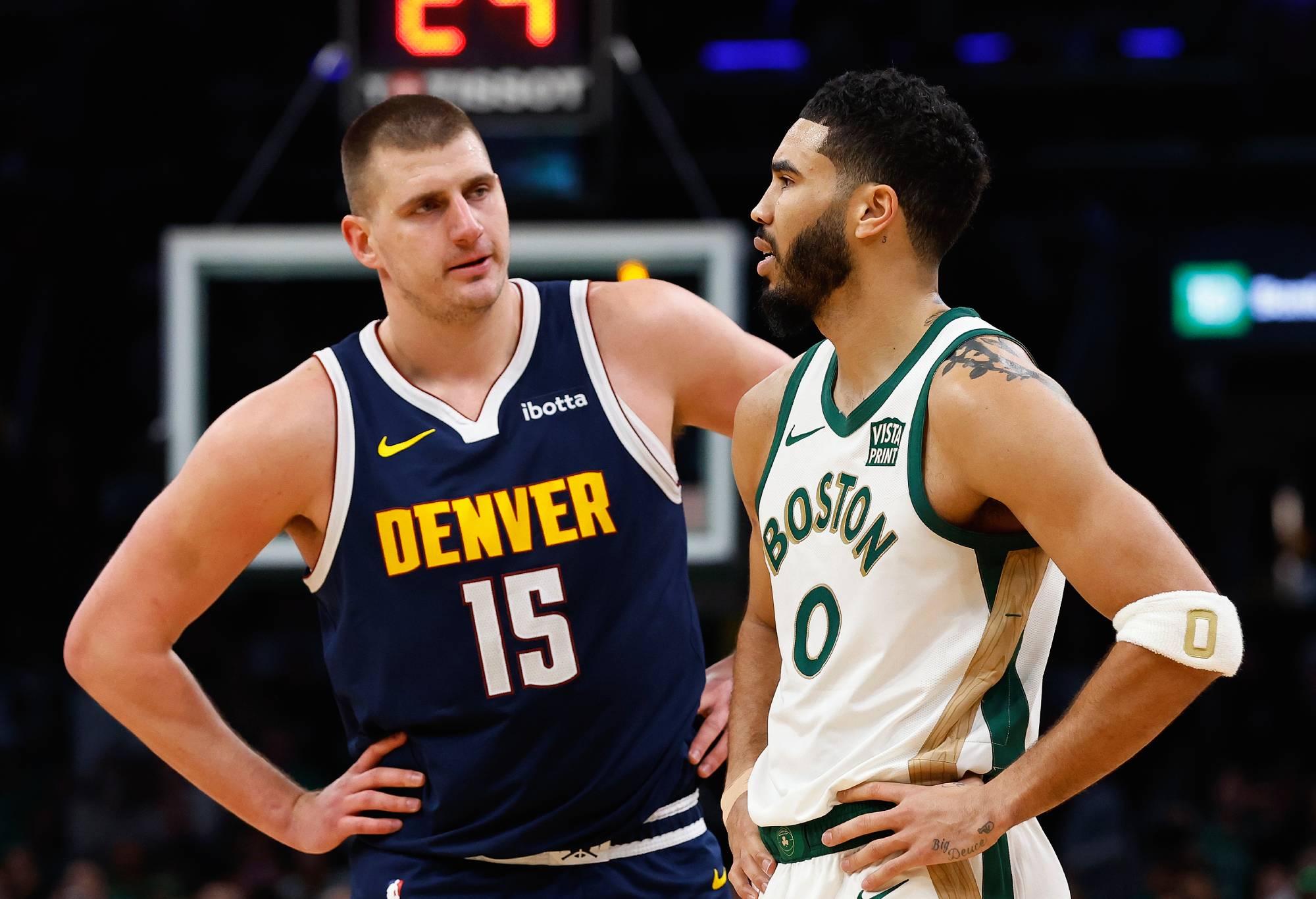 BOSTON, MA - JANUARY 19: Nikola Jokic #15 of the Denver Nuggets talks with Jayson Tatum #0 of the Boston Celtics during the second quarter at TD Garden on January 19, 2024 in Boston, Massachusetts. NOTE TO USER: User expressly acknowledges and agrees that, by downloading and/or using this Photograph, user is consenting to the terms and conditions of the Getty Images License Agreement. (Photo By Winslow Townson/Getty Images)