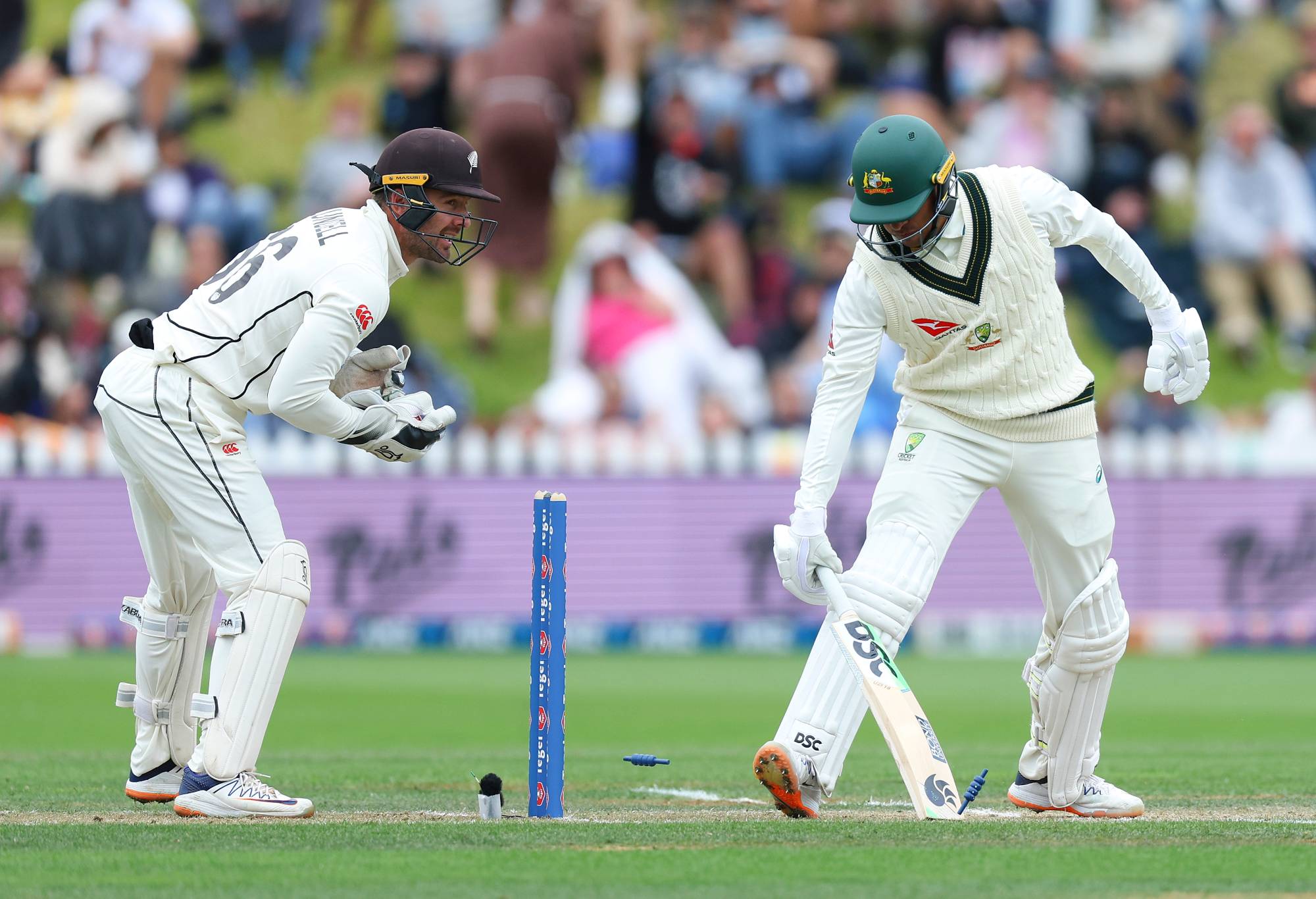 WELLINGTON, NEW ZEALAND - MARCH 02: Usman Khawaja of Australia is stumped by Tom Blundell of New Zealand during day three of the First Test in the series between New Zealand and Australia at Basin Reserve on March 02, 2024 in Wellington, New Zealand. (Photo by Hagen Hopkins/Getty Images)
