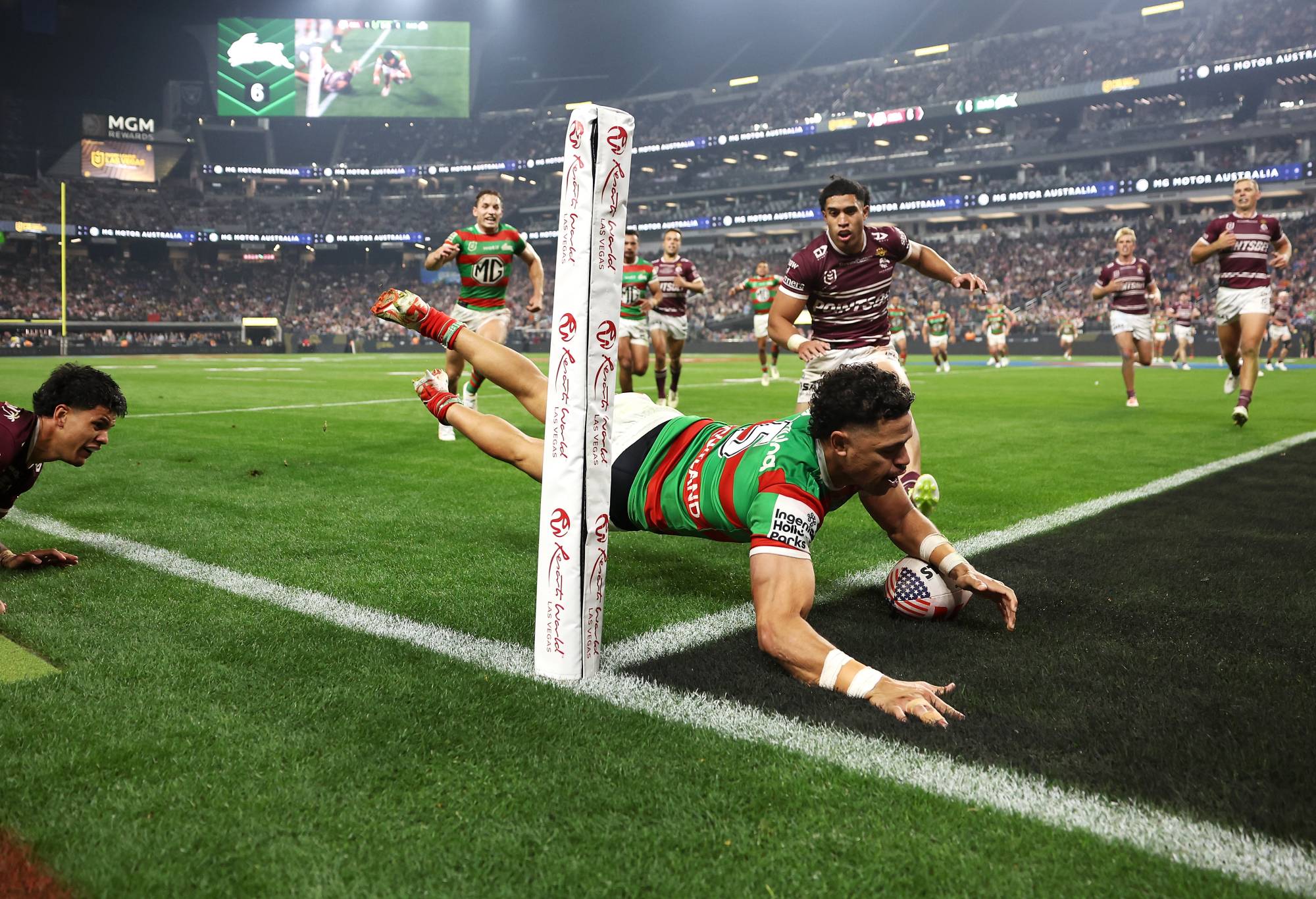 LAS VEGAS, NEVADA - MARCH 02: Jacob Gagai of the Rabbitohs scores a try during the round one NRL match between Manly Sea Eagles and South Sydney Rabbitohs at Allegiant Stadium, on March 02, 2024, in Las Vegas, Nevada. (Photo by Ezra Shaw/Getty Images)