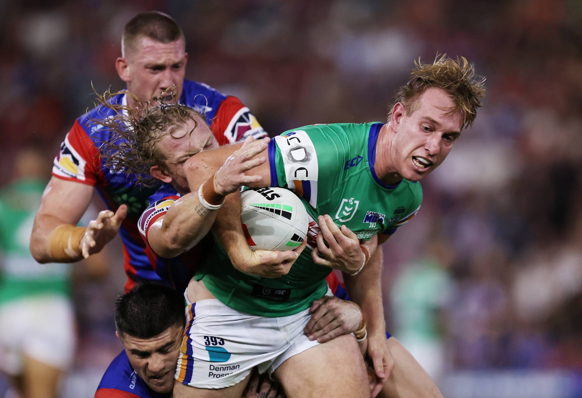 NEWCASTLE, AUSTRALIA - MARCH 07: Zac Hosking of the Raidersis tackled during the round one NRL match between Newcastle Knights and Canberra Raiders at McDonald Jones Stadium on March 07, 2024, in Newcastle, Australia. (Photo by Brendon Thorne/Getty Images)