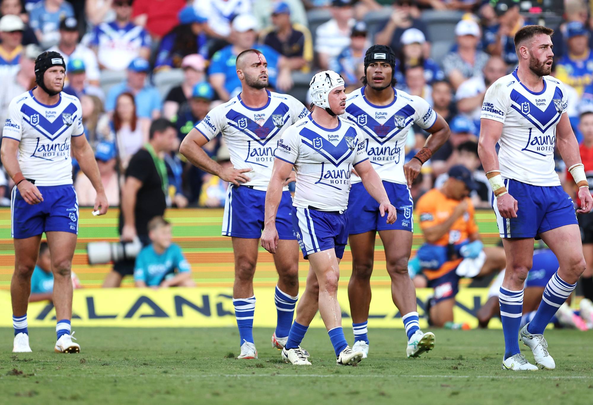 SYDNEY, AUSTRALIA - MARCH 09: The Bulldogs look dejected during the round one NRL match between Parramatta Eels and Canterbury Bulldogs at CommBank Stadium, on March 09, 2024, in Sydney, Australia. (Photo by Brendon Thorne/Getty Images)