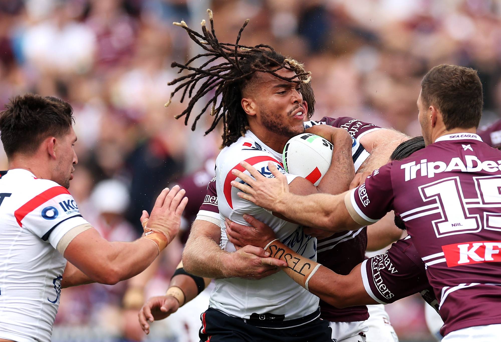 SYDNEY, AUSTRALIA - MARCH 17: Dominic Young of the Roosters is tackled during the round two NRL match between Manly Sea Eagles and Sydney Roosters at 4 Pines Park, on March 17, 2024, in Sydney, Australia. (Photo by Cameron Spencer/Getty Images)