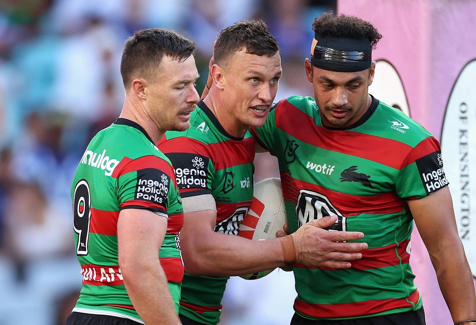 SYDNEY, AUSTRALIA - MARCH 29: Jack Wighton of the Rabbitohs celebrates scoring a try with team mates during the round four NRL match between South Sydney Rabbitohs and Canterbury Bulldogs at Accor Stadium, on March 29, 2024, in Sydney, Australia. (Photo by Cameron Spencer/Getty Images)