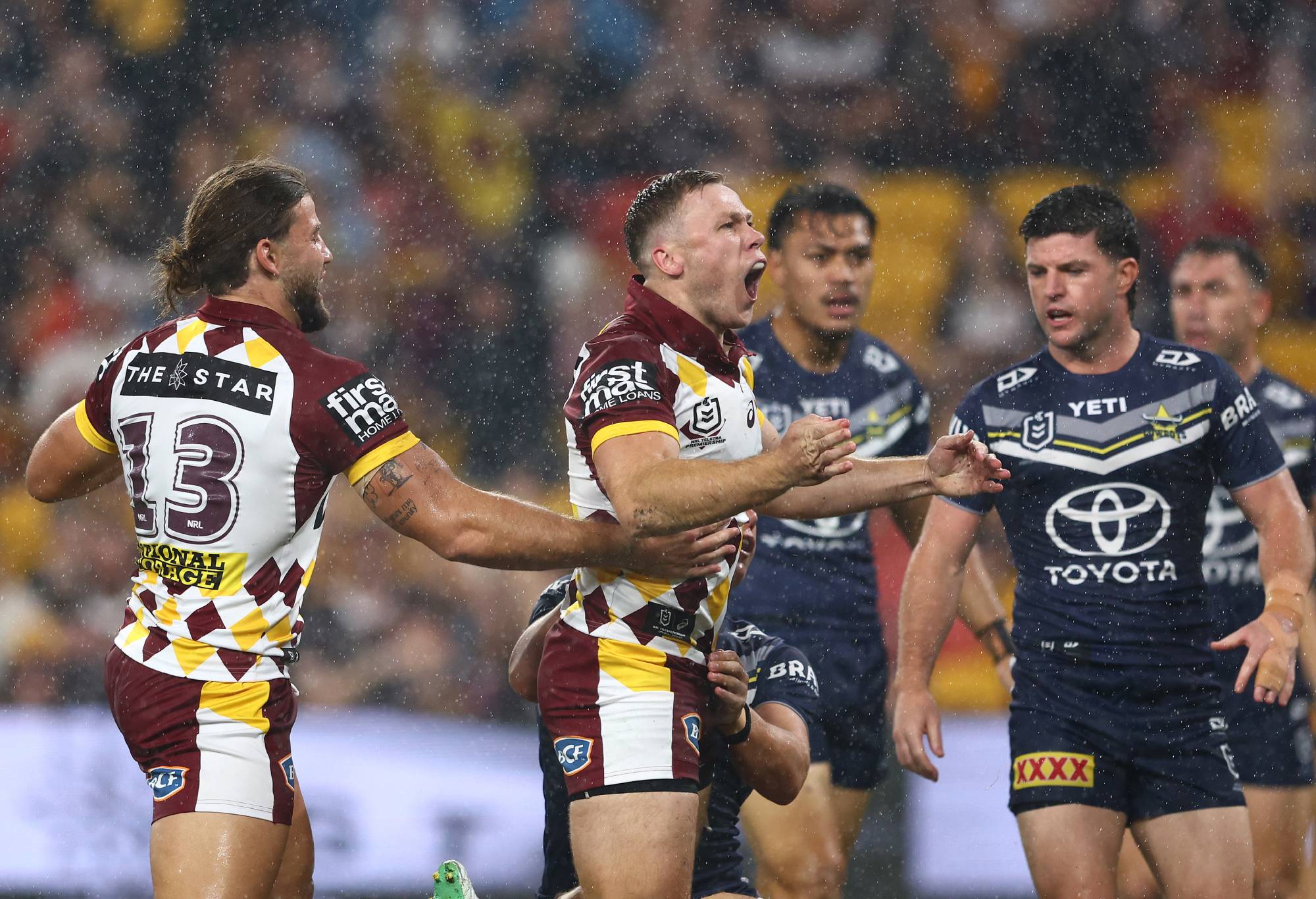 BRISBANE, AUSTRALIA - MARCH 29: Billy Walters of the Broncos celebrates a try during the round four NRL match between Brisbane Broncos and North Queensland Cowboys at Suncorp Stadium, on March 29, 2024, in Brisbane, Australia. (Photo by Chris Hyde/Getty Images)